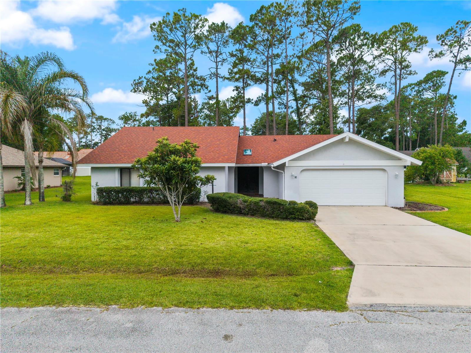 Welcome home to this beautifully maintained 4-bedroom residence, perfectly situated on an oversized lot with endless possibilities. Step through the impressive double-door entry into a bright,  floor plan featuring tile flooring throughout for easy maintenance and timeless style.  The spacious primary suite is a rare find, offering dual primary bathrooms that provide exceptional comfort, privacy, and convenience. Three additional bedrooms gives plenty of space for family, guests, or a home office.  Enjoy the screened-in lanai overlooking the expansive backyard, where there's ample room to add the pool or garden you've always envisioned. Whether you're looking for space to entertain, relax, or create your own outdoor oasis, this property offers the flexibility to make it your own.  With its generous lot, desirable layout, and unique features, this home is ready for its next owner. Schedule your private showing today!  HVAC 2024, ROOF 2023