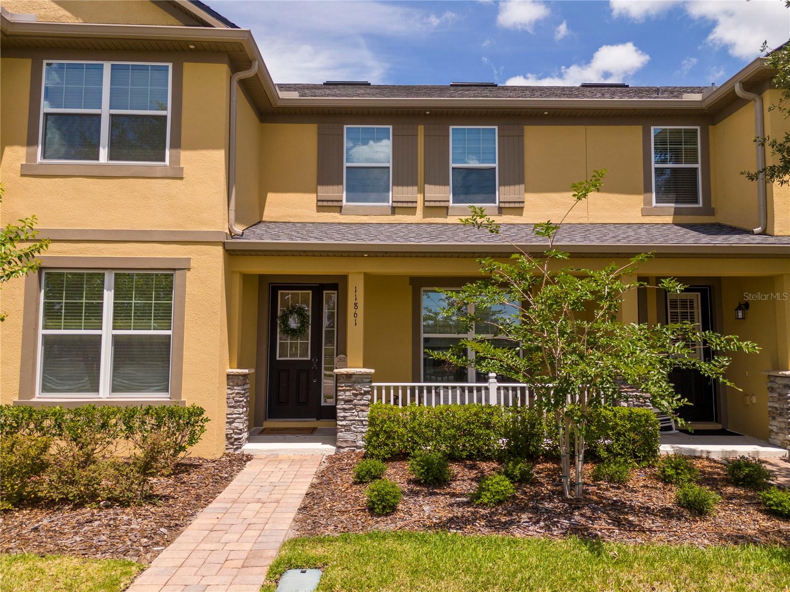 TOP RATED SCHOOLS. NO CARPET throughout the home!! Welcome to this beautifully maintained 3-bedroom, 2.5-bath townhome located in the highly sought-after Windermere Trails community! This spacious two-story home features an open-concept layout with a modern kitchen offering stainless steel appliances, ample cabinet space, and a large island overlooking the living and dining areas — perfect for entertaining. Upstairs, the spacious primary suite includes a walk-in closet and private en-suite bathroom. Enjoy the convenience of a rear-entry 2-car garage and low-maintenance living in one of Windermere’s most desirable locations. Community amenities include a resort-style pool, playgrounds, walking trails, dog park, and scenic green spaces. Ideally located near top-rated schools, shopping, dining, major highways, and Disney attractions. Don’t miss this incredible opportunity!