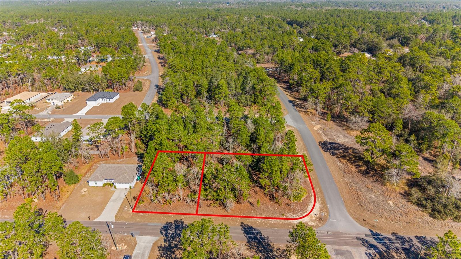 Discover this beautiful combined 0.58 +/- acre CORNER homesite, made up of two adjoining lots, in the highly desirable Citrus Springs community - an area known for its peaceful surroundings, natural beauty, and exciting growth. This unique double-lot corner location offers extra space, added privacy, and greater flexibility for designing your dream home. Nestled in a quiet neighborhood with paved roads and electric nearby, this property provides the perfect opportunity to build your forever home or make a smart investment in Florida's Nature Coast. With no HOA fees and zoning for single-family residential use, you'll enjoy the freedom to create a layout that fits your vision. Surrounded by newer homes, natural greenery, and the charm Citrus Springs is known for, this oversized property places you close to some of the area's best outdoor amenities. Enjoy easy access to the scenic Withlacoochee State Trail, Rainbow Springs State Park, Blue Run Park, Citrus Springs Community Center, golf courses, schools, shopping, and dining. Whether you're ready to build now or looking to secure land for the future, this spacious corner lot homesite offers endless possibilities in a welcoming and fast-growing community. Take a look before it's gone