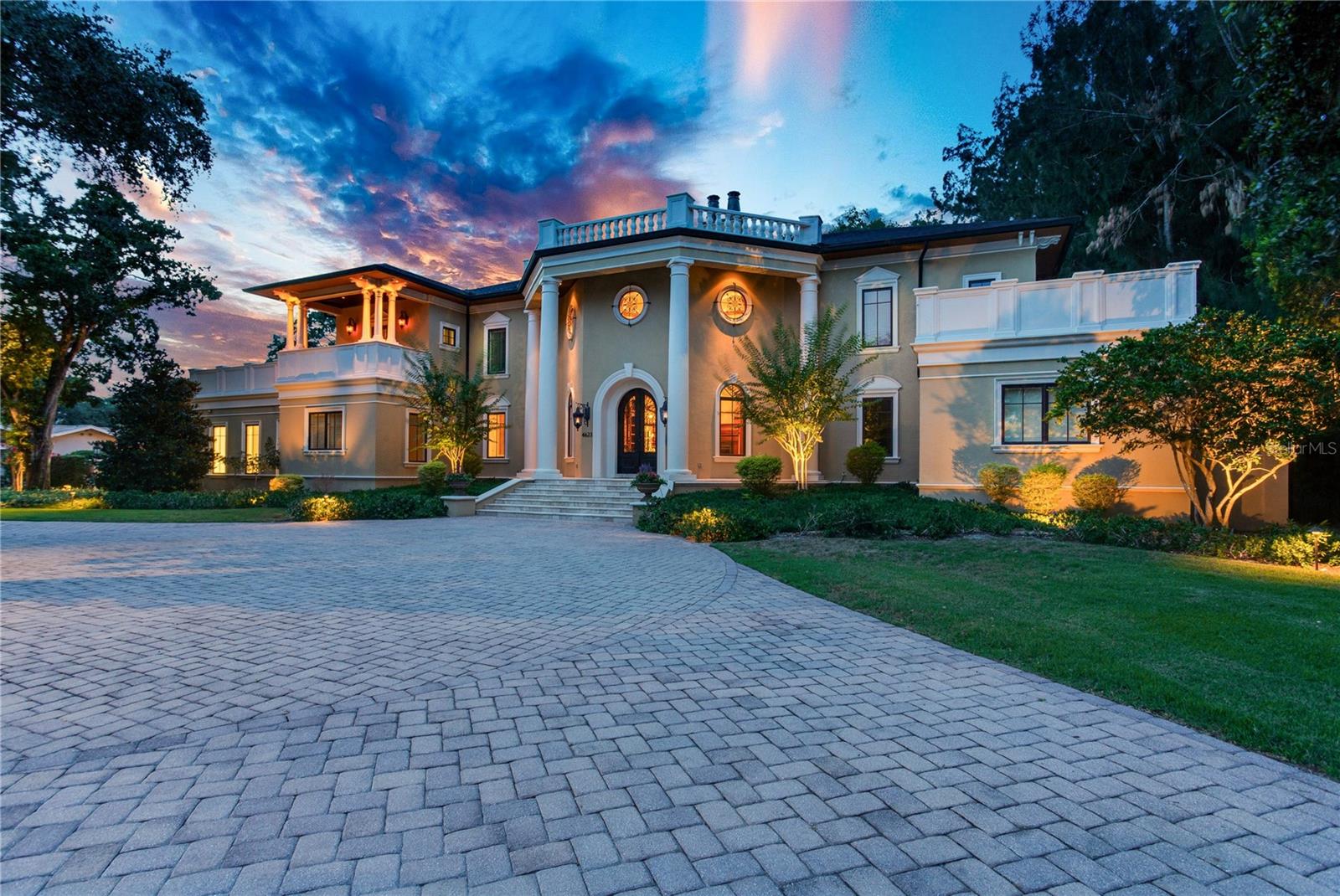 Set on one of the largest privately held parcels in all of South Tampa and spanning nearly two full acres, this estate offers an extraordinary level of privacy, presence, and possibility. With dual access roads and an additional fully fenced side street, the property provides both convenience and seclusion, a combination seldom found in the area.
Deeded for a single family residence with an existing guest house, this compound stands among Tampa’s most distinguished homes. The main residence features 5 - 6 bedrooms, thoughtfully designed to accommodate a variety of lifestyle needs. The second level hosts a grand family room and four expansive bedroom suites, including an oversized ensuite so generous it can easily function as a private living quarter with its own kitchenet and sitting room.
On the first floor, the impressive east wing opens onto a sweeping veranda overlooking the manicured lawn; an ideal setting for morning coffee or evening gatherings. Also located on the first floor, east wing is the primary suite which serves as a private retreat, featuring a spacious bedroom, an expansive walk-in closet complete with its own washer and dryer, and a beautifully appointed bath highlighted by a luxurious steam shower. The west wing includes an additional bedroom with full bath as well as a dedicated office, offering flexibility for work or guests.
At the heart of the home lies a massive gourmet chef’s kitchen, complete with an expansive dining and serving area perfect for entertaining on a grand scale. This space flows seamlessly into the great room and the home’s most breathtaking architectural feature: a dramatic two story foyer that doubles as a library and formal reception area. This soaring space creates an unforgettable first impression and is truly one of the most unique residential features in Tampa.
Beyond the main residence, the estate includes a spacious one story, two bedroom guest house. Whether envisioned as a private retreat, a future pool pavilion, recreation center, or redesigned guest quarters, the possibilities are endless thanks to the remarkable acreage.
The grounds are a rare luxury in themselves, offering ample room for resort style amenities. Existing features include a tennis/pickleball court, with abundant space remaining for a custom pool, outdoor entertainment area, a new guesthouse or multiple garages for an automobile collection.
This stately South Tampa mansion is a sanctuary for those seeking expansive land, architectural character, and exceptional privacy...an opportunity that seldom becomes available.
It is easily accessible to schools, shops, churches, the International Mall, two bridges and interstates to Pinellas or North Florida. It is minutes from Downtown Tampa and only 90 minutes from Disney.
