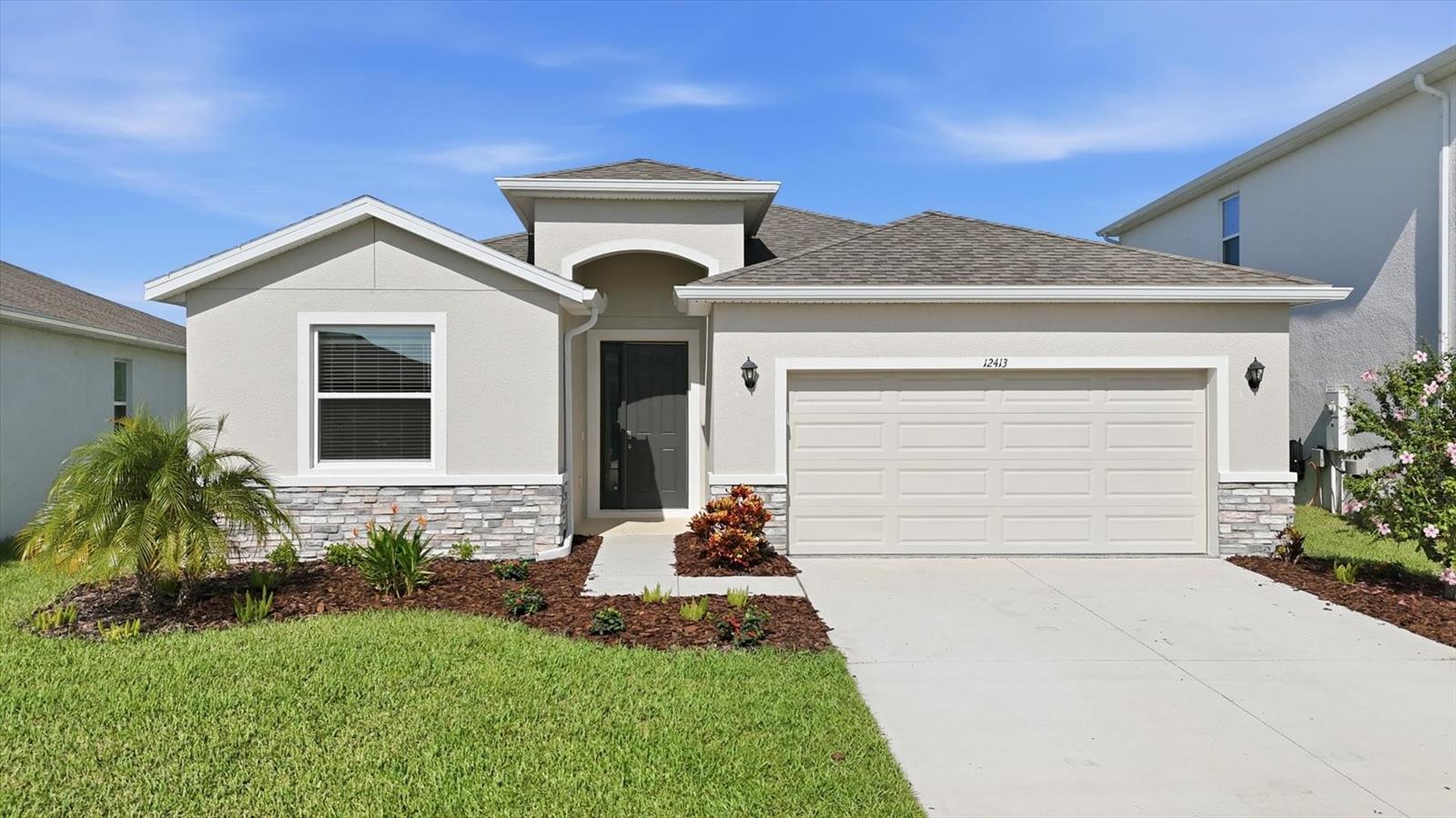 Thoughtfully upgraded beyond builder standards, this move-in-ready D.R. Horton Lantana model offers 4 bedrooms, 2.5 bathrooms, and 2,045 square feet of beautifully designed living space in the highly desirable Bella Lago community. Built with durable all-concrete block construction, this home offers the perfect blend of style, comfort, and everyday functionality.

The popular open-concept floor plan creates a bright, welcoming atmosphere, seamlessly connecting the kitchen, dining, and living areas for effortless entertaining and comfortable daily living. The kitchen is both stylish and functional, featuring bright white cabinetry, granite countertops, stainless steel appliances, a reverse osmosis drinking water system, and a large center island that naturally becomes the heart of the home.

The spacious primary suite provides a relaxing retreat with a tray ceiling, two walk-in closets, and an ensuite bathroom featuring dual sinks, an oversized vanity, a garden tub, separate shower, and a private water closet. Two additional bedrooms share a full bath, while the fourth bedroom and adjacent half bath provide exceptional flexibility as a guest room, home office, nursery, or hobby space.

Step outside to the screened lanai and discover one of this home's standout features—a generously sized, fully fenced backyard that's perfect for pets, outdoor entertaining, gardening, backyard games, or simply relaxing in your own private outdoor space.

Thoughtful upgrades throughout the home include a screened lanai, whole-house water filtration system, reverse osmosis drinking water system, epoxy-coated garage floor, overhead garage storage racks, front gutters, upgraded landscaping, ceiling fans, and a generator-ready 50-amp outlet with an installed interlock kit.

Bella Lago residents enjoy outstanding community amenities, including two resort-style pools, a clubhouse, fitness center, playground, and dog park. Conveniently located near I-75, I-275, and US-301, you'll enjoy easy access to Bradenton, Sarasota, St. Petersburg, Tampa, and Florida's beautiful Gulf Coast beaches. The rapidly growing Moccasin Wallow corridor, with BayCare Hospital, shopping, dining, and everyday conveniences, continues to make this one of Parrish's most desirable locations.

Featuring one of Bella Lago's most popular floor plans, thoughtful upgrades beyond builder standards, a spacious fenced backyard, and an exceptional location, this home is ready for its next owners to enjoy the very best of Florida living.