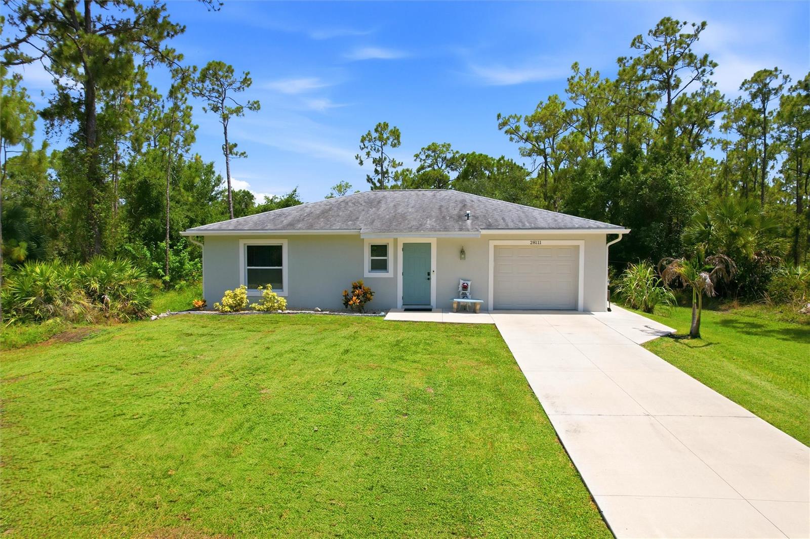 Nestled in the desirable Tropical Gulf Acres community of Punta Gorda, this beautifully built 2021 home offers the perfect blend of modern construction, thoughtful upgrades, and laid-back Florida living. Tropical Gulf Acres is known for its spacious homesites, peaceful setting, and convenient location, while remaining just minutes from historic downtown Punta Gorda, Fishermen's Village, waterfront parks, restaurants, shopping, festivals, and year-round community events. Commuting is a breeze with convenient access to I-75 and US-41, and travel is easy with both Punta Gorda Airport (PGD) and Southwest Florida International Airport (RSW) nearby. Whether you're headed to Port Charlotte, Cape Coral, or Fort Myers, you'll appreciate the central location. Featuring 2 bedrooms, 1.5 baths, and a 1-car garage, this move-in-ready home is loaded with upgrades designed for comfort, convenience, and peace of mind. The stylish kitchen features granite countertops, soft-close cabinetry and drawers, and a complete 2021 appliance package, including the refrigerator, range, microwave, and dishwasher. A reverse osmosis system services the kitchen sink and refrigerator ice maker, while a water softener and filtration system provides quality water throughout the home.  The spacious primary bedroom features a built-in closet and shares a Jack-and-Jill bathroom with the guest bedroom, offering both privacy and convenience.  Offering added peace of mind, this home is equipped with impact-resistant windows and doors helping protect your investment while reducing the hassle of storm preparation. Enjoy Southwest Florida's year-round outdoor lifestyle from the screened and covered lanai, complete with hurricane shutters, or unwind on the pergola-covered patio—perfect for entertaining, grilling, or relaxing. A 10' x 10' storage shed offers additional storage for tools and outdoor equipment.  As an added bonus, the vacant lot directly across the street is also available for purchase, offering a unique opportunity for additional privacy, future expansion, or investment. If you're looking for newer construction with quality upgrades and a peaceful location close to everything Punta Gorda has to offer, this exceptional home is ready to welcome you. Schedule your private showing today!
**PLEASE ENJOY THE 3D INTERACTIVE VIRTUAL TOUR ASSOCIATED WITH THIS LISTING**