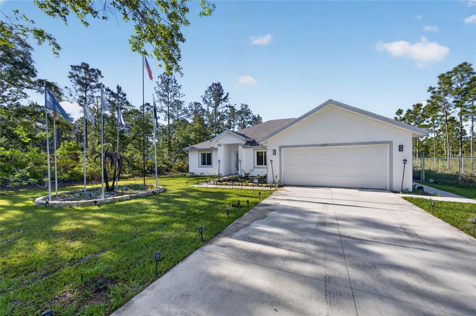 Are you running out of space? Kids running all around the house? You need a fenced yard and more room in your neighborhood! HOME: This one-year-old property solves the problem of not having everything you need when you buy new construction. In the last year, this owner has added a six-foot fence so the kids can play on moving day. Seller has added a security system so you can go exploring with peace of mind. The flagpole in the front yard is already in place, ready for your flag. The irrigation system is done. So your one-year-old home is now super move-in ready! Finance all these things in your mortgage so you don't have to come up with the funds after move-in day. This 3-bedroom, 2-bathroom home has a split plan and the gathering space is the whole middle of the house: kitchen, living room, dining room, breakfast nook, island for barstool seating, and sliding doors to back porch. You'll be able to see all the kids, all the time. There's a separate alcove when you walk in that is perfect for a kids TV Room / Play Room. BLOCK: There are a few neighbors around in case you need a cup of sugar, but there are no adjacent neighbors, so enjoy the peace and quiet and privacy from the front or back porches. Let the kids run and play and scream and yell for fun! Palm Avenue was designed as the center of the community, with a median for space and beauty. Less than a mile from the back entrance to the public golf course, you can easily and quickly drive your golf cart to the clubhouse or golf pro shop on the private roads. COMMUNITY: Indian Lake Estates (informally, ILE) was designed to be close to everything in Florida, but with large, oversized, ½-acre lots for privacy and room for toys. One hour to the ocean in Vero Beach, and just under 90 minutes to the Gulf in Clearwater. Orlando and Tampa are easy drives for concerts, shopping and access to cruise ports. Miami is a few hours away via Highway 27, the Florida Turnpike, or Interstate 95. The beautiful and challenging golf course was designed by Gary Cobb, who went on to design for the PGA. The clubhouse restaurant is open 7 days a week, complete with a game room, multipurpose room, ballroom and patio view of the putting green and golf course. Because the roads are private, you may drive your golf cart a couple miles down the road to the largest lake in Polk County, Lake Weohyakapka, or on all 135+ miles of neighborhood roads inside and outside the gate. What a perfect way to introduce fishing to the kiddos! There are two huge playgrounds at the clubhouse for the kids to blow off steam after school or on the weekends. There's a library for getting some fun books to read each week! The active community offers dances and concerts for line dancing and letting all the stress of the week out, karaoke and trivia nights, weekly card games, bingo, movie nights, a book club, PLUS basketball, pickleball and tennis courts, just to name a few. Indian Lake Estates is a perfect balance of privacy and activity. Ask your real estate agent to get you in to see this home today! ILE IS THE PLACE TO BE!