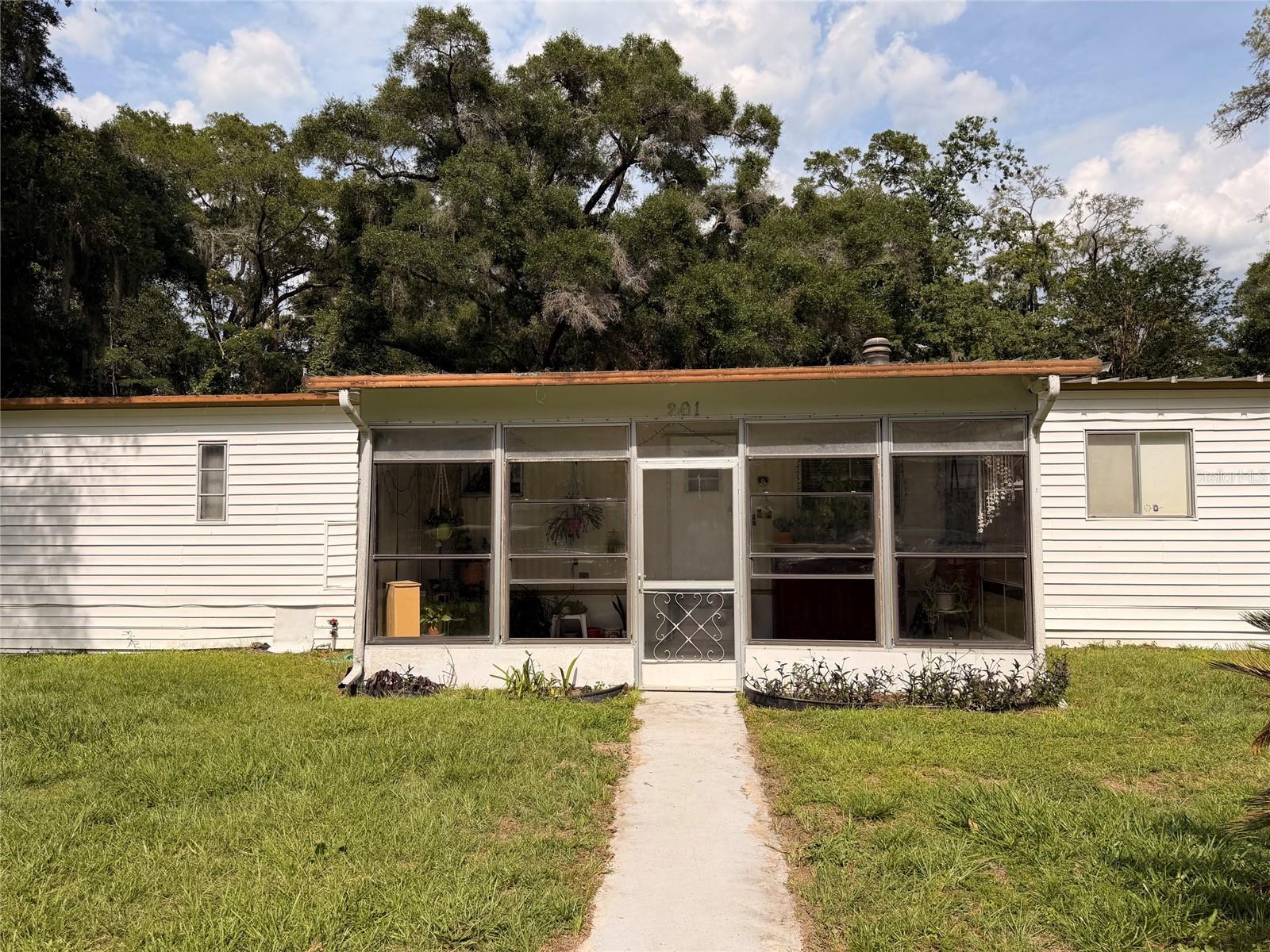 Welcome home to peaceful country living in the heart of Ocala! Situated on nearly half an acre in Rainbow Park, this charming 3-bedroom, 2-bath manufactured home offers the perfect blend of space, privacy, and affordability.

Step inside to find a comfortable and functional floor plan with plenty of room for everyday living, entertaining, or simply relaxing at home. The split-bedroom layout provides privacy for the primary suite, while the additional bedrooms offer flexibility for family, guests, a home office, or hobbies.

Outside, you’ll love the expansive yard with endless possibilities. With almost half an acre of land, there’s ample space for gardening, outdoor gatherings, pets, recreational vehicles, or creating your own backyard oasis. Enjoy the freedom of country-style living while still being conveniently located near shopping, dining, schools, and all that Ocala has to offer.

Whether you’re a first-time homebuyer, looking to downsize, seeking an investment opportunity, or simply searching for a place with room to spread out, this property delivers exceptional value and potential.

Don’t miss your chance to own a slice of Florida living with space, privacy, and opportunity all in one package. Schedule your private showing today!