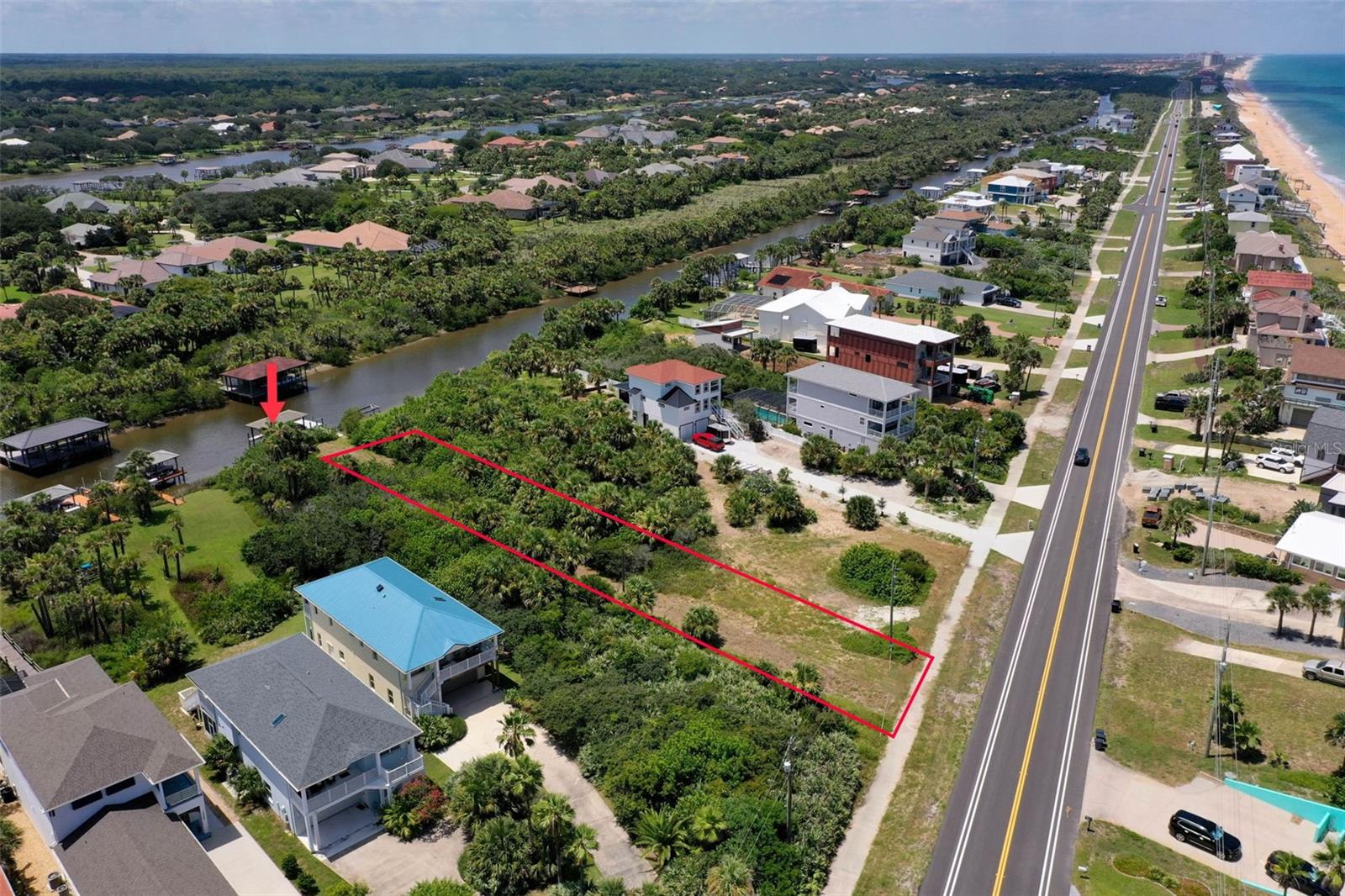 MAJOR PRICE IMPROVEMENT!! Check out this TODAY! ...Want to Build a Home in Flagler Beach and have the Ocean to the East and the Intracoastal Waterway to the West? Here is your opportunity to do so WITH a Covered Dock WITH LIFT already in place! There is a Deeded Beach Access across the Street that is included with the property! This Vacant, Mostly Cleared parcel is on FOX CUT Saltwater Canal and has DIRECT ACCESS to the INTRACOASTAL WATERWAY! Take a Beautiful Boat Cruise North to St. Augustine Inlet or South to Ponce Inlet! No Wait to Build or Rush to Build. BUY NOW and BUILD LATER! 

**THE PROPERTY BOUNDARIES SHOWN HERE (In Red in Pictuers) ARE FOR ILLUSTRATIVE PURPOSES ONLY AND MAY NOT REFLECT THE EXACT LEGAL PROPERTY LINES. ALL PROPERTY DIMENSIONS ARE APPROXIMATE AND SHOULD BE INDEPENDENTLY VERIFIED BY A SURVEYOR.**
