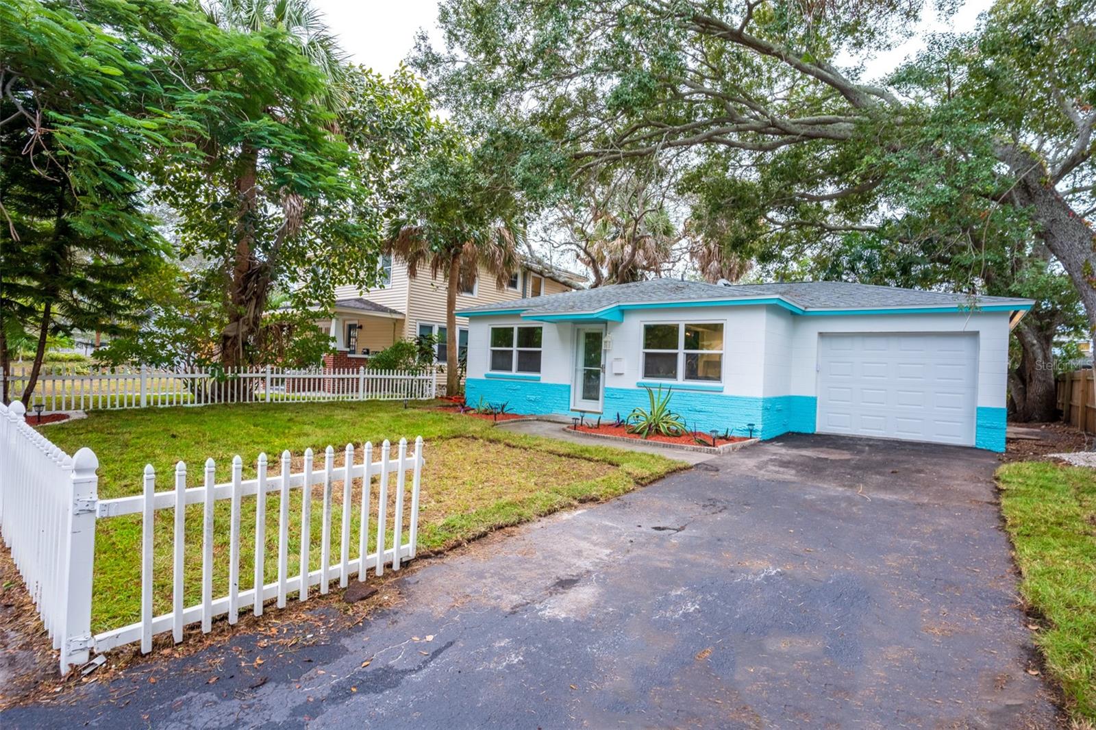 Incredible Opportunity To Own A Fully Renovated Old Southeast Home On A Spacious Lot. This Three (3) Bedroom, Two (2) Bathroom Single Family Residence Epitomizes Modern Comfort And Convenience. Situated Just Blocks Away From Lassing Park (The Bay), A Quick Five-Minute Drive To Downtown St. Petersburg, And A Mere Fifteen Minutes From Pristine, World Class Beaches. Step Inside To Experience Perfection! This Single Level Haven Boasts An Exquisite Makeover - Featuring An Upgraded Kitchen, Brand-New Bathrooms, Stunning Flooring Throughout, Revitalized Landscaping, And Fresh Interior/Exterior Paint. Revel In The Brand-New Roof (2023), A/C System (2023), White Vinyl Windows (2023), And Water Heater (2023). Crafted For Longevity! Constructed With Solid Concrete Block And Positioned On An Elevated Lot, This Home Graciously Spares You The Worries Of Being In A Flood Zone. The Back Yard Is Expansive And Ready For You To Add Your Finishing Touches. With Immediate Availability, This Move-In-Ready Haven Awaits Your Personal Touch. Schedule A Showing Today And Experience This Beautiful Home In Person!