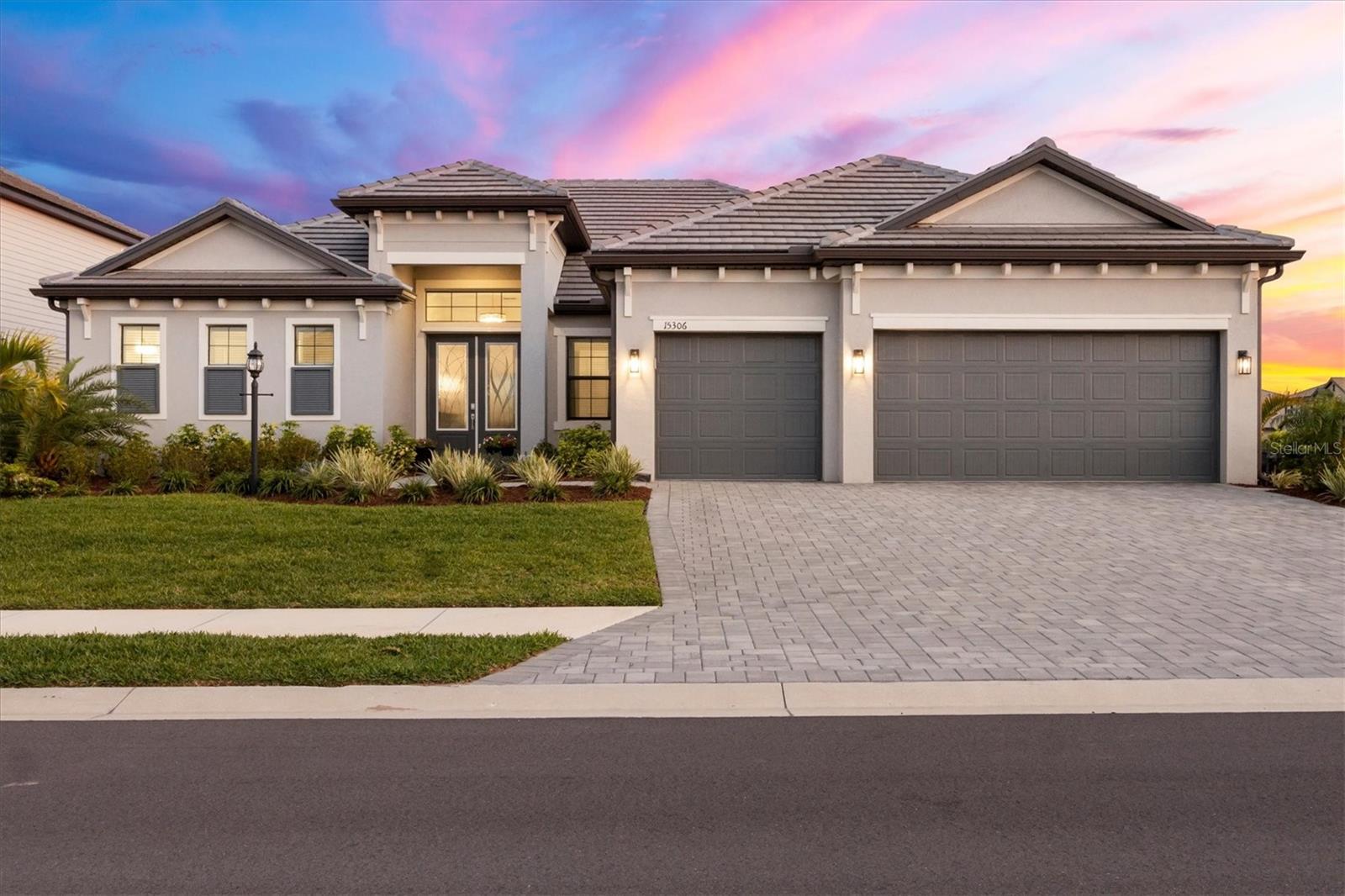 This exceptional three- bedroom, three bath home with private office in the sought-after Lorraine Lakes community of Lakewood Ranch is where refined design meets effortless Florida living. This beautifully appointed residence showcases elegant upgrades and thoughtfully curated finishes throughout. Sellers are willing to include all furniture and EZ-GO Golf Cart as an option for buyers looking for a turnkey move in experience with an added bonus of pre-paid pool maintenance through the end of 2026. 

A grand first impression begins with double-leaded glass front doors, opening to a light-filled interior defined by wood-inspired plank tile flooring, custom window treatments and sophisticated architectural details.

The expansive great room serves as the heart of the home, featuring a custom-built entertainment wall, a cozy fireplace and tray ceilings enhanced by designer lighting, creating a warm yet elevated space ideal for everyday living and entertaining. The gourmet kitchen is equally impressive, offering a large center island, gas cooktop, built in wall oven, quartz countertops, stainless steel appliances and abundant cabinetry. A spacious dining area flows seamlessly from the kitchen, positioned for gatherings intimate and grand.

The primary suite is a serene retreat, complete with private slider access to the lanai and tranquil outdoor views. The spa-inspired primary bath features an oversized dual-sink vanity and a generously sized walk-in shower. A split-bedroom floor plan ensures privacy for guests, with each bedroom offering its bath, including one that conveniently serves as a pool bath.

Go outside to your oversized custom lanai, an entertainer’s dream, expansive covered living space and a large pool overlooking a lush, private yard enhanced by newly installed, upgraded landscaping. This outdoor oasis offers a backdrop for enjoying Florida’s year-round sunshine and peaceful surroundings with panoramic lake views, beautiful sunrises and majestic sunsets.

In Lorraine Lakes, one of Lakewood Ranch’s most amenity-rich gated communities, residents enjoy a resort-style lifestyle with a grand clubhouse with restaurant, fitness center, resort-style pools with poolside bar, tennis and pickleball courts, basketball, volleyball, a splash park, playground and a full calendar of social events led by an on-site lifestyle director. With beautifully maintained surroundings, scenic lakes and convenient access to Lakewood Ranch’s premier shopping, dining and Gulf Coast beaches, this community offers luxury and connection in an unparalleled setting.



This is more than a home, it’s a lifestyle defined by comfort, elegance and the best of Lakewood Ranch living.