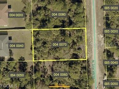 Vacant Lot with approved permits for single family home with 3 bedroom + Den and 2 bathroom in a total of 1,650 square feet. The spacious open floor plan seamlessly connects living areas, creating an atmosphere of effortless sophistication perfect for both intimate family moments and entertaining guests. The versatile den serves as your personal sanctuary, whether you envision a home office for remote work, a cozy reading retreat, an artistic studio, or perhaps a playroom where creativity flourishes. This flexible space adapts to your evolving needs, making it one of the home's most valuable features. Each of the three bedrooms offers comfortable proportions and abundant natural light, while the three full bathrooms provide convenience and privacy for busy households. The generous lot size provides endless opportunities for outdoor enjoyment and future expansion. Whether you dream of lush landscaping, a sparkling pool, expansive entertaining areas, or simply appreciate the space to breathe, this property delivers the foundation for your vision. Location convenience enhances the appeal, with East Lee County High School just moments away, ensuring educational excellence remains within easy reach. The established Lehigh Acres community offers the perfect balance of suburban tranquility and urban accessibility, with shopping, dining, and recreational opportunities nearby.