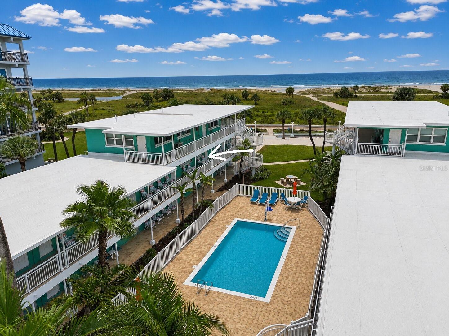 Beachfront Investment Opportunity with Stunning Gulf Views and Rare Short-Term Rental Flexibility! Welcome to Unit 29 at Tropic Terrace, a fully renovated and spacious 1-bedroom, 1-bath condo located directly on the sands of Treasure Island. This larger floorplan offers beautiful Gulf views from the kitchen, dining, and living areas, creating the perfect coastal setting for both owners and guests to enjoy. Tropic Terrace is one of the few beachfront communities on Treasure Island allowing short-term rentals with no minimum rental restrictions and no full-time occupancy requirements, making this an excellent opportunity for personal use, vacation rentals, or long-term investment potential. All utilities are included in the monthly condo fee, including cable, internet, electricity, water, sewer, trash, insurance, exterior maintenance, grounds maintenance, pest control, pool maintenance, parking, and escrow reserves. This creates a truly turnkey ownership experience whether you plan to use the property as a vacation rental, seasonal getaway, or full-time residence. Following the recent hurricanes, the community completed extensive renovations and improvements throughout the common areas. Owners and guests now enjoy refreshed exterior spaces, updated amenities, beautifully maintained grounds, and a renovated pool area that enhances the overall beachfront experience. Unit 29 did not experience flooding during the recent hurricanes, offering added peace of mind and making this unit stand out within the community. The property is professionally managed by Belloise Realty, providing owners with an established management option for short-term rentals and day-to-day operations. Whether you are searching for a turnkey beachfront rental property, seasonal getaway, or income-producing investment, Unit 29 offers the rare combination of location, flexibility, and Gulf-front living in the heart of Treasure Island!