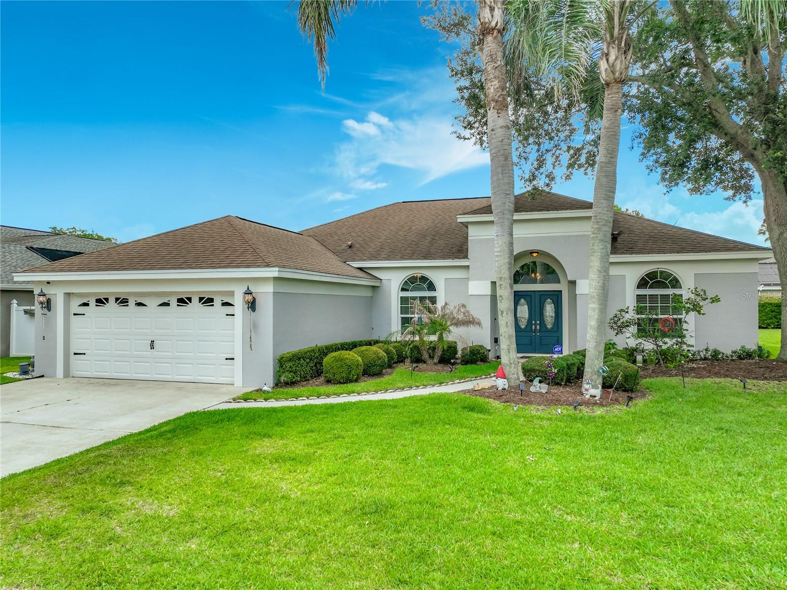 "Honey, stop the car!" This well-kept 3-bedroom, 2-bath home is located in the popular Plantation Grove West community. The kitchen and bathrooms were remodeled in 2022, and the primary bath features both a shower and a beautiful free-standing tub.

The home has no carpet and includes a full pool enclosure with planted shrubs for privacy, as well as a nice-sized lanai. It is the perfect home for both entertainment and quiet moments.

Don't wait—see it now before it's gone! Please let me know if you would like more information or to schedule a viewing.
