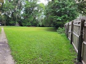 Across from Butler Plaza, Robinwood Subdivision behind  bank and Food plaza.  3.5 parcels included.  Lot 15, lot 16, lot 17 and partial of lot 18.  for a total of 2.17 acres.   Possible re-zoning light commercial MU1 low density.  Please check with City/County directly for zoning confirmation.  Value is on the land and possible future use, house on the property is sold AS IS.