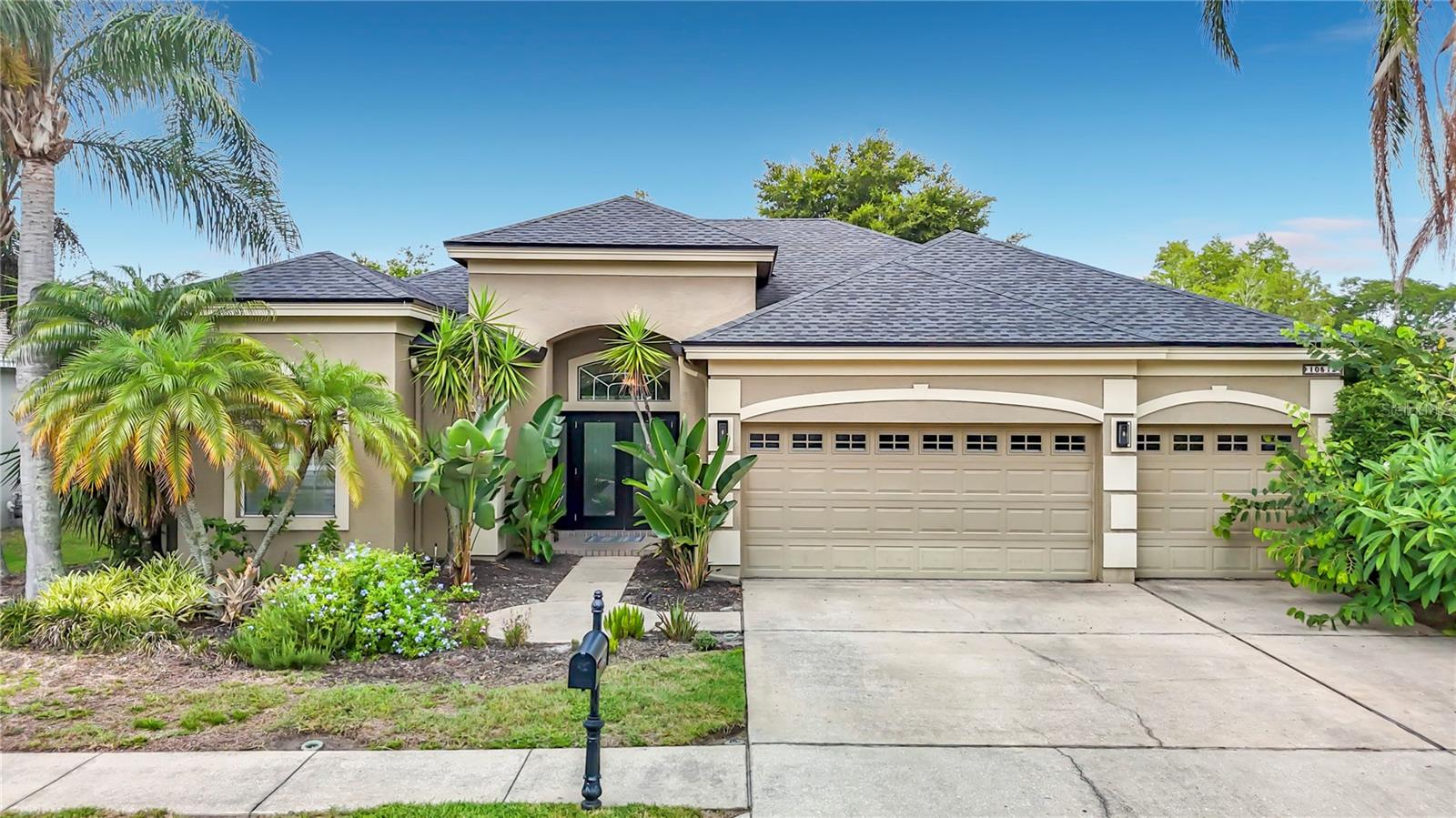 Welcome to this beautifully maintained 4-bedroom, 3-bath pool home with a 3-car garage, ideally situated on a private conservation homesite in one of Trinity’s most desirable communities. Offering over 2,400 square feet of thoughtfully designed living space, this home combines timeless elegance with modern updates and exceptional indoor-outdoor living.  Step inside to soaring ceilings, an open split-bedroom floor plan, and gorgeous wood-look flooring that flows throughout the main living areas. The heart of the home is the spacious chef’s kitchen featuring updated cabinetry, stunning quartz countertops, stainless steel appliances, a large center island, breakfast bar, abundant storage, and an inviting eat-in dining area overlooking the family room.  The expansive primary suite provides a peaceful retreat with direct access to the lanai, dual walk-in closets, and a spacious en-suite bath with dual vanities, a soaking tub, and separate walk-in shower.  Sliding glass doors lead to your private screened outdoor oasis complete with a sparkling pool, covered lanai, and tranquil conservation views—perfect for entertaining or simply relaxing with no rear neighbors.  Additional highlights include a formal dining room, generous secondary bedrooms, high ceilings throughout, mature tropical landscaping, and a spacious three-car garage offering plenty of room for vehicles, storage, or hobbies.  Conveniently located near top-rated schools, golf courses, parks, shopping, restaurants, medical facilities, and just a short drive to the Veterans Expressway, Tampa International Airport, and Florida’s award-winning Gulf beaches.

This move-in-ready Trinity home offers the perfect combination of comfort, privacy, and Florida lifestyle. Schedule your private showing today!