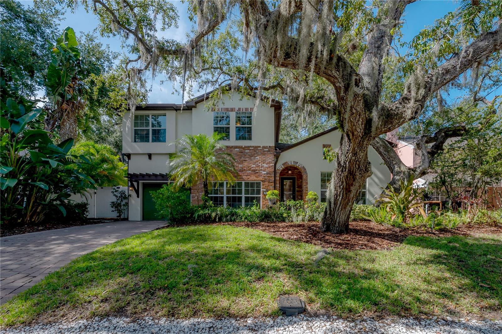 Welcome to this exceptional Bayshore Beautiful residence, where timeless design, thoughtful architecture, and luxurious livability come together in one truly remarkable home. Extensively renovated with more than $300,000 in custom improvements, every space has been carefully curated to offer effortless everyday living while providing the flexibility today's families desire. Designed in collaboration with architect Chris Joiner, the home's expansive floor plan seamlessly blends sophisticated entertaining spaces with comfortable private retreats. The first-floor primary suite serves as a tranquil sanctuary, featuring a spa-inspired bath, oversized walk-in closet, private access to the screened lanai, and convenient proximity to the laundry room. Two additional main-level bedrooms offer exceptional versatility for guests, a nursery, home office, or den. The second level is equally impressive, with soaring ceilings, abundant natural light, a spacious loft ideal for a media room or playroom, two generously sized bedrooms with custom walk-in closets, and a beautifully appointed full bath. The home's evolution reflects a commitment to quality craftsmanship and intentional design. A comprehensive renovation in 2012 expanded the original residence to include a third bedroom, breakfast room, attached one-car garage, screened lanai, and a dramatically enlarged primary suite with an expansive walk-in closet. In 2015, a thoughtfully designed second story added two additional bedrooms, a full bath, and an expansive loft, creating a highly functional five-bedroom floor plan that adapts beautifully to a variety of lifestyles. Recent enhancements include remodeled primary and powder baths (2020-2021), a new roof over the original portion of the home (2022), new hot water heater (2022), new main water line (2021), updated ceilings with recessed LED lighting (2022), fresh interior paint (2022-2023), and new carpeting in the secondary bedrooms and loft (2023), allowing the next owner to enjoy true move-in-ready convenience. Ideally situated walking distance from Bayshore Boulevard, Tampa Yacht & Country Club, Ballast Point Park, Gandy Boulevard, Dale Mabry Highway, and the Selmon Expressway, this residence offers exceptional access to everything that makes South Tampa one of the area's most sought-after neighborhoods. Beautifully maintained, meticulously updated, and impossible to fully appreciate through photographs alone, this is a home that must be experienced in person. Offering a rare combination of architectural character, designer finishes, and exceptional functionality, it is ready to welcome its next chapter.