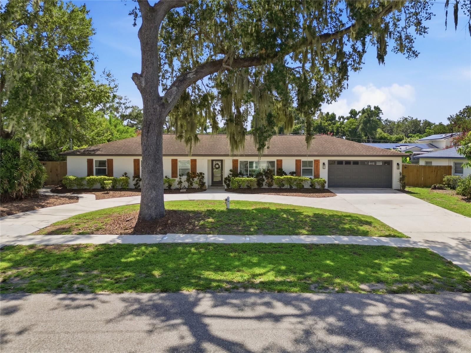 Welcome to this beautifully renovated Brandon home! Ideally located just minutes from I-75 and Brandon Town Center and only 30 minutes from the Tampa Airport. This exceptional residence is even more impressive in person. Completely remodeled to like-new condition, it offers the perfect blend of modern style, quality craftsmanship, and everyday functionality. This spacious home features 4 bedrooms, 3 full bathrooms and a spacious in-ground pool that has just been refinished and creates the perfect backyard retreat for relaxing or entertaining.
Designed with flexibility in mind, the layout includes two primary suites, making it ideal for multi-generational living or hosting guests, along with two additional bedrooms. The stunning chef’s kitchen showcases custom wood cabinetry, granite countertops, a massive center island with a prep sink, and stainless steel appliances—an ideal space for cooking, gathering, and entertaining. Step outside to a large covered patio with plenty of room to create your dream outdoor kitchen and seating area. The fully fenced backyard provides privacy and ample space for families and pets to play. As an added bonus, the home’s effective year built is 2016, which may help reduce homeowners insurance costs compared to similar homes. This is a rare opportunity to own a truly move-in-ready home in one of Brandon’s most convenient locations. Schedule your private showing today!