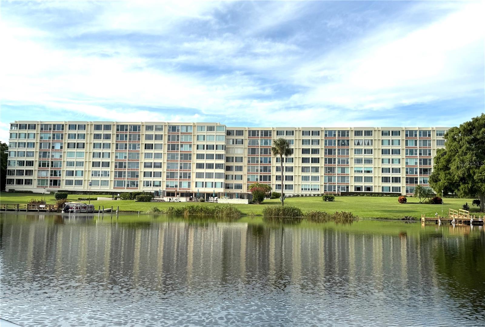Winter Haven's premier condominium located directly overlooking the picturesque Lake Spring that is part of the famous 17-lake Winter Haven Chain of Lakes. Be the first to enjoy this beautiful extensively remodeled and upgraded 5th floor corner unit directly off of the elevators. Lots of natural light through the expansive windows looking out to Lake Spring and the pool area. Lots of storage closets and an extra storage locker. Its turn-key & ready to move into. Exquisitely maintained building and has passed the newly required Florida State Milestone Inspection & Reserves Study. Many amenities including a covered assigned parking space, guest parking, boat slips & fishing pier, paver brick pool area, large work-out room, library and community room w/ kitchen. Outdoor grills for your use, shuffle board & patio furniture on the huge pool deck overlooking Lake Spring. Publix shopping center by walking across the side street is a great convenience. Close to downtown No pets or smoking. Owner will consider different leasing and/or purchase & financing options. Short term seasonal or long term lease. Tenants and/or buyers have to be approved and interviewed by the HOA as this is a 98% owner occupied building. Nicest condominium building in Polk County with full-time maintenance and management on-site daily.