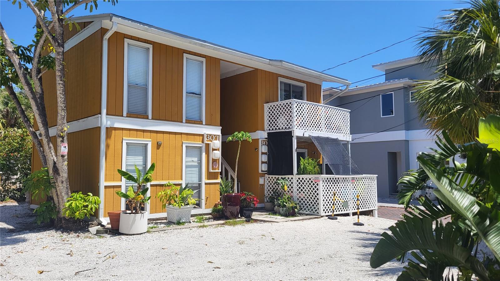 Prime Investment Opportunity in Laurel Park – Fabulous 4-Plex with Exceptional Income Potential! Discover your next smart investment in the heart of Laurel Park, one of Sarasota’s most desirable and historic neighborhoods. Just three blocks from vibrant Main Street and minutes from the city’s renowned Gulf Coast beaches, this charming 4-unit multifamily property offers a rare chance to own premium real estate in a high demand location. The property consists of two separate buildings, each featuring an upper and lower 1-bedroom, 1-bath apartment, with ample off-street parking for tenants. All units are currently leased to reliable annual tenants, ensuring immediate income. For investors seeking to maximize returns, this property offers significant upside as a short-term rental, with the potential to generate substantially higher income through weekly bookings in a vacation-friendly market.