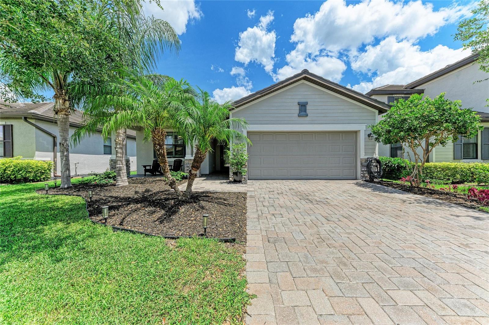 4.875% ASSUMABLE LOAN!!!  Beautifully updated home in the sought-after COPPERLEFE community featuring an open-concept layout and split floorplan designed for comfortable Florida living. Interior upgrades include crown molding, plantation shutters, updated light fixtures.  Hard surface flooring throughout including tile, laminate, and bamboo.  The kitchen offers stainless steel appliances and opens directly to the main living and dining areas, creating a functional space for everyday living and entertaining. Recently remodeled bathrooms include an updated primary suite with a frameless glass shower and garden tub.  Enjoy a private backyard with peaceful water views and mature oak trees. Additional features include hurricane shutters, newly installed feature walls, a recently pressure washed roof, recently sealed driveway, and a spacious 2-car garage.  Move-in ready and conveniently located near shopping, dining, golf, and Gulf Coast beaches.  TURNKEY OPTION negotiable.
