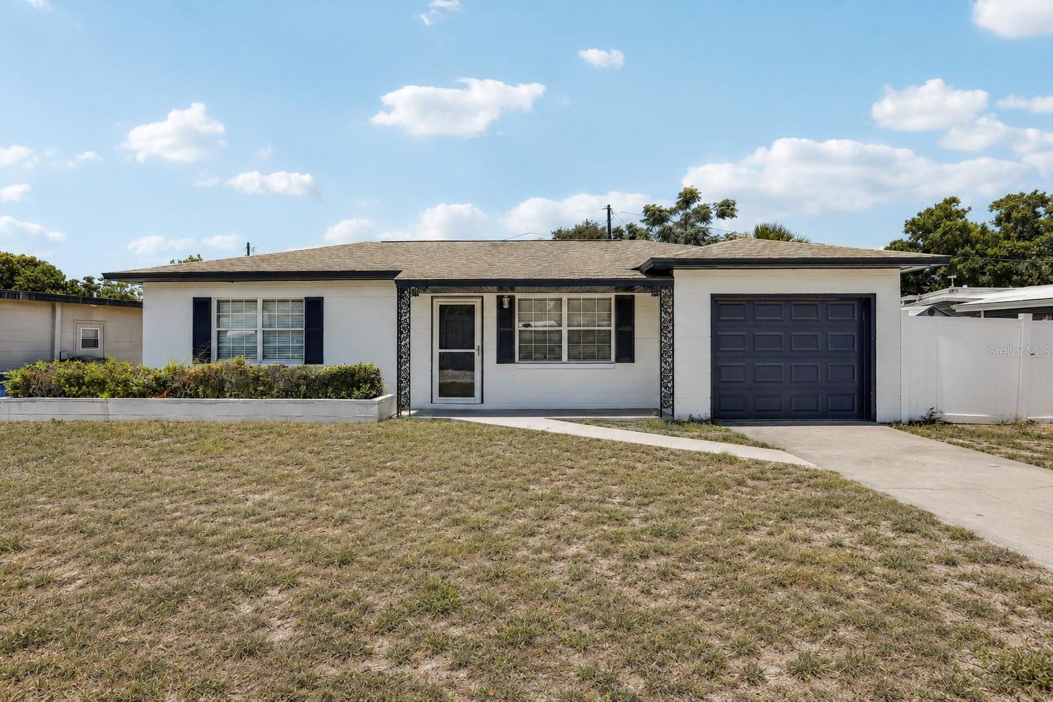 Updated and move-in ready, this 2-bedroom, 1-bath home features new flooring throughout, a renovated kitchen with new appliances, refreshed bedrooms and bath, and fresh interior and exterior paint. A versatile bonus room provides additional living space and is ideal for a dining area, den, or flex space. Enjoy year-round outdoor living from the large screened patio, perfect for relaxing or entertaining. Situated in desirable Flood Zone X, this home is just minutes from downtown Safety Harbor, Clearwater Beach, Honeymoon Island, Downtown Dunedin, shopping, dining, parks, Tampa International Airport, and major commuter routes. An excellent opportunity to own a move-in-ready home in the heart of Clearwater, offering exceptional value and convenient access to everything Tampa Bay has to offer.