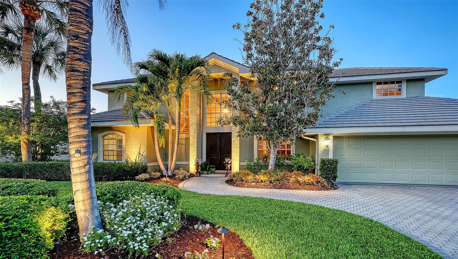 Welcome to this beautifully custom-built John Cannon home located in the sought-after gated community of Turtle Rock.  This 4-bedroom, 3.5-bath pool home blends comfort, style, and functionality for everyday living. Offering over 2,900 square feet of thoughtfully designed living space.   Inside you’ll find custom wood flooring, soaring cathedral ceilings, and an open-concept floor plan perfect for gathering with family and friends. The spacious first-floor primary suite provides convenience and privacy, while the generous secondary bedrooms offer plenty of room for family, guests, or home office space.  Step outside to your private backyard retreat featuring a sparkling pool enclosed by a newer oversized pool cage—ideal for outdoor entertaining, play, and year-round Florida enjoyment.  Additional highlights include a 3-car garage with abundant storage, a whole-house Culligan water system, and natural gas.  Conveniently located near top-rated schools, shopping, dining, Siesta Key Beach, and everyday essentials including Costco Wholesale, this home offers the perfect combination of luxury, location, and family-friendly living. NEW ROOF SCHEDULED IN JUNE.