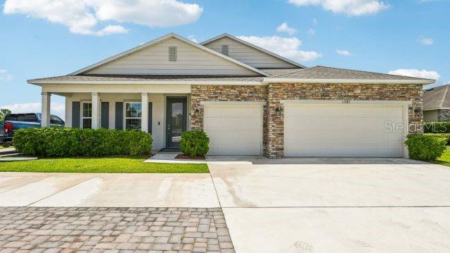 Pre-Construction. To be built. Experience the best of Florida Gulf Coast living in the Wilmington, a thoughtfully designed home that combines style, comfort, and modern convenience in beautiful Venice, Florida. A welcoming covered front porch, paver driveway, and professionally landscaped yard with irrigation create outstanding curb appeal, while architectural shingles and Energy Star glass windows add lasting quality and efficiency.

Step inside to discover an inviting open foyer highlighted by soaring 9'4" flat ceilings that enhance the home's spacious feel. Just off the entry, double French doors open to an oversized den, providing the perfect setting for a home office, study, hobby room, or flexible living space.

The heart of the home is the expansive great room, illuminated by six LED lights and filled with natural light, creating a bright and welcoming atmosphere. Flowing seamlessly into the dining area and chef-inspired kitchen, this open-concept design makes everyday living and entertaining effortless. Granite countertops, a large center island, stainless steel appliances and abundant workspace provide both style and functionality. Sliding glass doors extend the living space outdoors to the patio, creating an ideal setting for relaxing or gathering with guests.

Privately situated on one side of the home, the primary suite serves as a peaceful retreat. Four LED lights brighten the spacious bedroom, while the spa-inspired bath features dual sinks, a walk-in tile shower, a linen closet, and a generous walk-in closet. Two additional bedrooms and a full bath are located on the opposite side of the home, creating a comfortable layout with privacy for everyone.

Modern smart home features, including a Ring Video Doorbell, Smart Thermostat, Keyless Entry Smart Door Lock, and Deako Switches, provide convenience and control at your fingertips. A spacious three-car garage offers ample room for vehicles, storage, hobbies, or a workshop area. The home is also backed by a full builder warranty for added confidence.

Beyond your front door, Venice invites you to embrace a relaxed coastal lifestyle. Spend your days at Venice Beach or Caspersen Beach, explore the Legacy Trail, enjoy boating adventures, or watch dolphins play along the shoreline. Sarasota is only 30 minutes away, providing easy access to exceptional shopping, dining, cultural attractions, and nightlife.

The Wilmington is designed for comfortable everyday living, effortless entertaining, and enjoying the very best of Venice. It is a place where beautiful surroundings, thoughtful design, and modern amenities come together to create an exceptional place to call home.