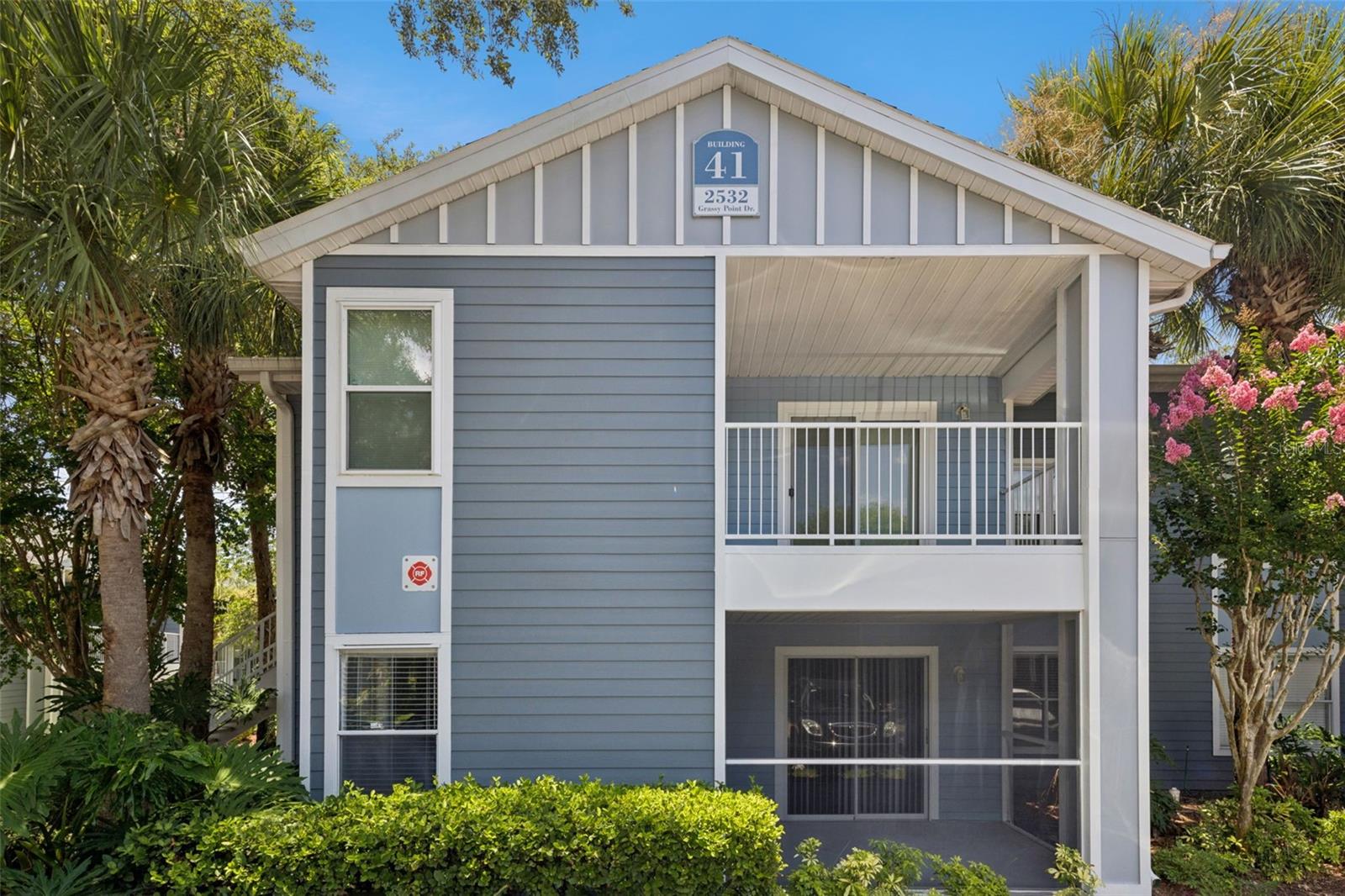 Beautifully Upgraded 2-bedroom Condo in Lake Mary ~ Lovely two bedroom, one bath, ground floor, corner unit condo in the gated, waterfront community of Regency Park at Lake Mary! All new exterior siding has given this desirable community a tastefully updated facade! Step inside to an open floor plan with living/dining room combo, galley kitchen overlooking the main living space, and split bedroom layout for added privacy. The upgraded kitchen features white cabinetry with crown molding, glass tile backsplash, pendant lighting above the breakfast bar, pull-down faucet, and all appliances included! Closet pantry and separate laundry room off the kitchen with ample storage space and side-by-side washer/dryer included! Laminate flooring throughout the living room and both bedrooms ~ tile in the kitchen and bath! Upgraded doors, window casings, light fixtures and blinds. Two spacious bedrooms with ceiling fans, large windows and lots of natural light! Primary bedroom has large walk-in closet and private access to the full bath. The bathroom has an additional door leading out to the hallway for easy guest access. Upgraded vanity, cabinet storage above the toilet, and glass enclosed stand-in shower. This location is zoned for top-rated Seminole County schools, including Lake Mary High! Commuters enjoy quick easy access to I-4 and just 25 minutes drive to Downtown Orlando! Located off Lake Emma Rd, just a few blocks from major shopping centers, where you'll find Publix, Target, TJ Maxx, HomeGoods, Starbucks and more! Regency Park offers residents beautiful amenities including clubhouse, two swimming pools, fitness centers, tennis courts, two gated entrances and lovely gazebo and park overlooking Greenwood Lake!