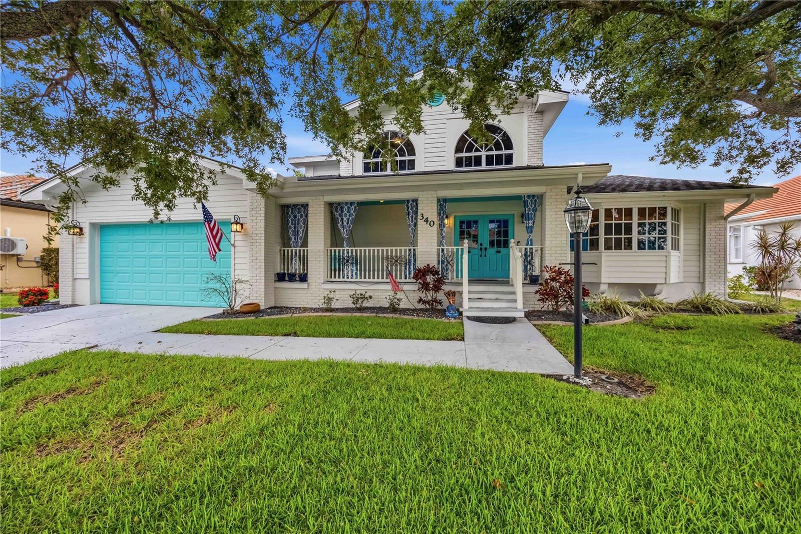 Sailboat water, no bridges to the Gulf, a 10,000 lb boat lift, and room for a 37+ foot vessel or larger right in your backyard. Welcome to one of Burnt Store Isles' most impressive waterfront estates, where the lifestyle sells itself before you ever step inside.
Tucked away on a quiet cul-de-sac in Burnt Store Isles, this elevated Craftsman-style home makes a statement from the moment you arrive. Steps lead up to an expansive covered front porch, the kind of space that immediately tells you this home lives differently than everything else on the market. With 77 feet of saltwater canal frontage, direct bridge-free Gulf access, and 3,241 square feet of heated living space plus an additional 1,229 square feet of covered outdoor areas, this 4-bedroom, 3-bathroom two-story residence checks every box for the serious Florida waterfront buyer.
Inside, a dramatic two-story foyer sets the tone with soaring ceilings and an open staircase. The chef's kitchen features solid wood shaker cabinets, stone countertops, and stainless steel appliances, all overlooking the pool, canal, and dock. Multiple French doors connect the living and dining areas to the outdoors, and wide-plank 12x48 tile runs continuously throughout the entire home. A wood-burning stone fireplace with stone surround anchors the living room, while crown molding and high ceilings carry through every space.
The main floor includes three bedrooms, two full bathrooms, and a generously sized laundry room with utility sink, folding station, and cabinetry. Upstairs, the private primary suite spans approximately 775 square feet and opens to a screened balcony with sweeping canal views. The ensuite bathroom features a double vanity, dedicated dressing vanity, garden tub, and separate glass-enclosed shower. A custom walk-in closet measuring 18x13 completes the retreat.
Step outside to a 30x15 screened, heated saltwater pool with a newly replaced screen enclosure (2023), surrounded by covered lanai space ideal for year-round entertaining. The concrete dock with electric and water supply and 10,000 lb lift are ready for use. This is true sailboat water with no bridges between you and the Gulf, meaning unrestricted access to Charlotte Harbor and beyond. The seawall is concrete and maintained by the City of Punta Gorda through the Burnt Store Isles Canal Maintenance District, removing that expense and responsibility from the homeowner entirely. A fully fenced yard with iron fencing keeps the breeze flowing while a lawn irrigation system keeps everything green year round.
Major updates are already done: roof replaced (2023), pool screen enclosure replaced (2023), two zoned A/C systems (replaced 2022 and 2024), two water heaters replaced (2022), ductwork cleanout (2022), and concrete dock rebuild (2022). An oversized two-car garage with workbench, storage space and attic access rounds out the package. Twin Isles Country Club is approximately one mile away and offers golf, tennis, and dining with a separate membership. Furnishings negotiable.