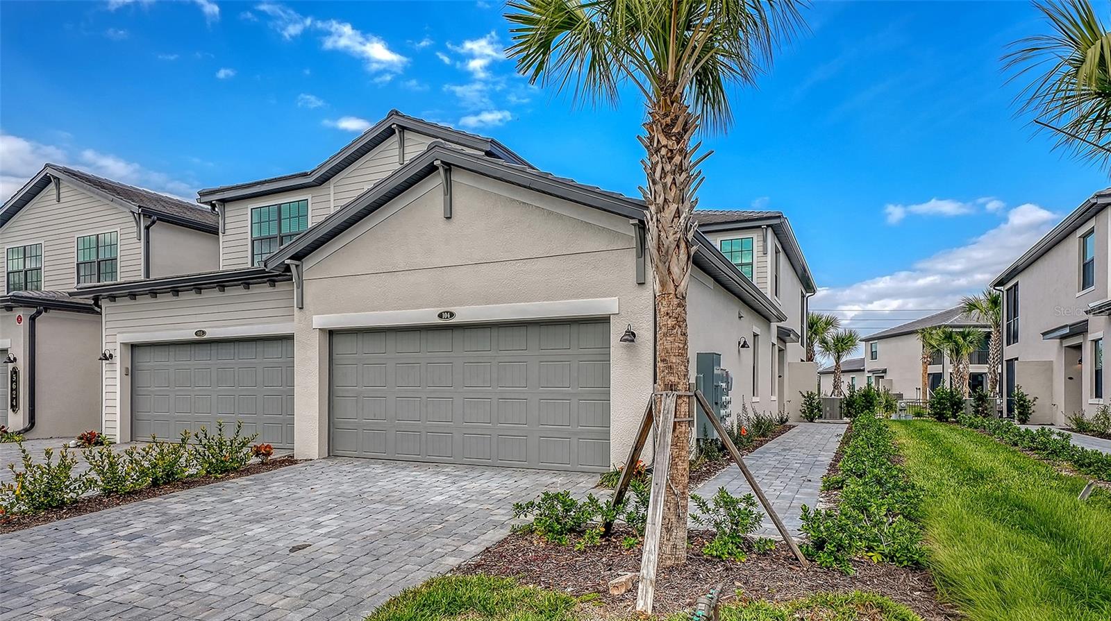 Legends Cove | New Construction | Immediate Occupancy | Priced to Move     

**Opportunities like this don't last — and savvy buyers know it. Welcome to Legends Cove, one of Bradenton's most sought-after new communities, where refined design and effortless Florida living come together in perfect harmony.
This stunning coach home delivers 3 bedrooms, 2 bathrooms, and single-level living — a combination that's increasingly rare in today's market. From the moment you walk in, the quality is undeniable. The chef's kitchen is a showstopper: quartz countertops, stainless steel appliances, and an open-concept layout bathed in natural light, designed equally for elegant entertaining and laid-back everyday living.
The living space flows seamlessly to a covered lanai overlooking serene pond and fountain views — your private retreat for morning coffee or sunset wine, year-round.
This home has been thoughtfully upgraded beyond the standard build — and it shows:

** Designer lighting fixtures — curated throughout for ambiance and modern style
** Premium ceiling fans — keeping every room comfortable year-round
** Epoxy-finished garage floor — a polished, durable upgrade that sets this home apart
** Paver driveway — elevated curb appeal from the moment you arrive

As a resident of this gated community, you'll also enjoy a resort-style pool — a future social hub that will only add to your return on lifestyle and investment.

Location is everything — and this one wins:

** Anna Maria Island beaches — Gulf Coast perfection, just minutes away
** IMG Academy — the world-renowned sports training campus, right around the corner
** SRQ Sarasota-Bradenton International Airport — stress-free travel at your doorstep
** Downtown Sarasota — fine dining, arts, and culture within easy reach

Whether you're raising the next elite athlete, catching weekend flights, or simply chasing sunsets on the Gulf, this address delivers it all.
This is turnkey, move-in-ready living at a price that reflects a motivated seller — meaning your window is now. Don't wait!! Schedule your showing today.
