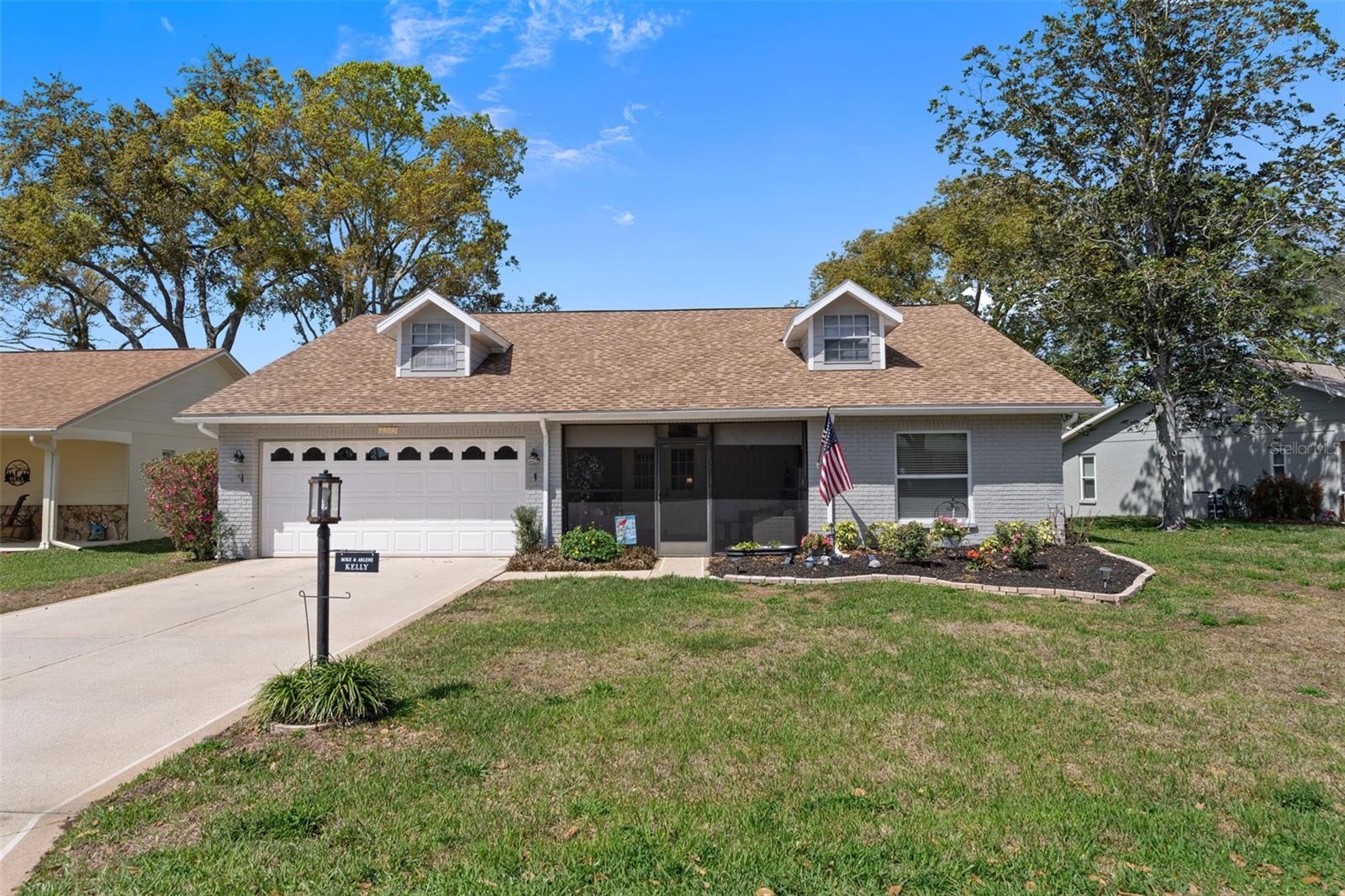 Here is your opportunity to buy an updated home with all of the desired space and rooms to meet all of your needs. With great curb appeal, the first area you will notice is the screened in front porch. A great relaxing area to sit and read a book or just enjoy your afternoon cocktails.
Upon entering the front double doors you will notice the luxury flooring throughout. This home has been updated with a dream kitchen. If you are looking for plenty of easy open cabinet space then this is your kitchen.  Stainless steel appliances and a special coffee station, 
the home was designed to offer you plenty of sitting and privacy areas.  The wall that separates the formal living area from the family area offers you a built in fireplace.  In addition there is a 4 season lanai with a separage cooling device.  Off of the lanai you will find you outdoor area with plenty of space for your cook-outs. The bathroom's are updated and offer a walk-in handicap assessable shower. The home offers a 2022 roof and a 2010 hvac system. This home is a must see and is located in The Timber Pines 55+ resort community. The community offers 4 golf courses, a driving range, putting greens, pickleball, tennis, a multimillion dollar fitness and wellness center, a full time restaurant , 2 pro-shops, swimming pools with hot tubs, and a performing arts center for shows and events. Some of the funiture may convey.  Call for a showing today.
