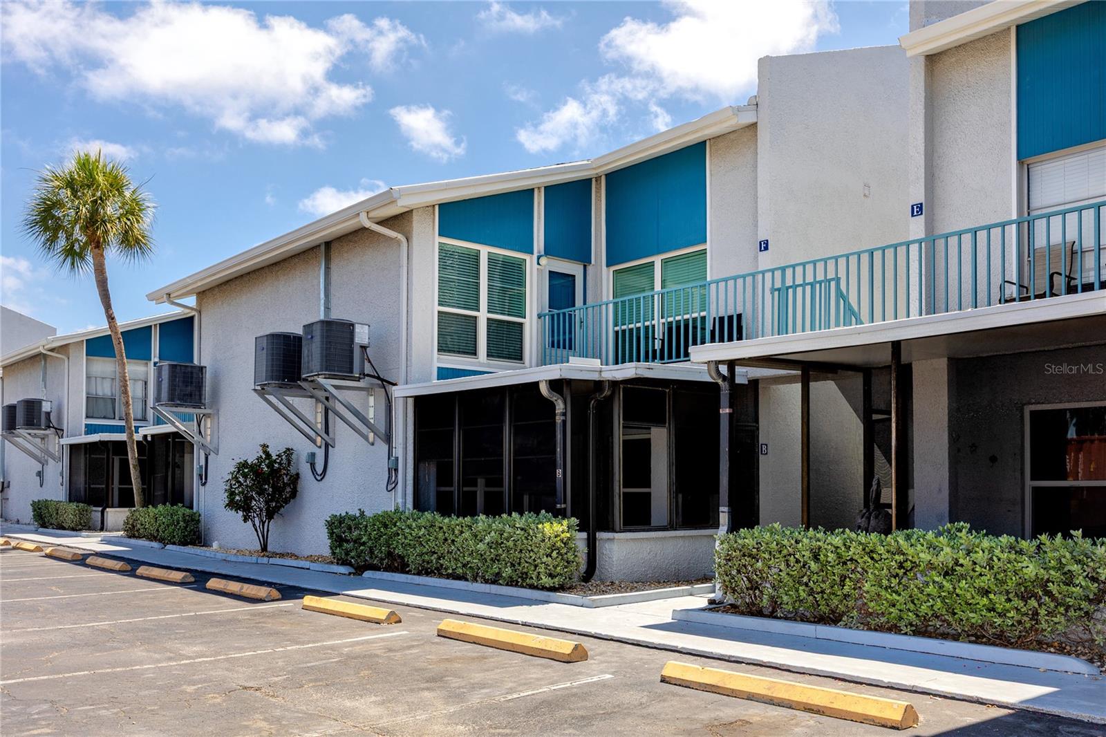 This furnished one-bedroom condo on the second floor sits inside a gated waterfront community steps from the Gulf of Mexico, positioned as a personal retreat and a short-term rental that can carry its own weight. The 1-week minimum lease and consistent visitor demand in this zip code make it one of the cleaner income plays on the Pinellas beach corridor.
The open floor plan moves easily from the kitchen through to the living space, with solid wood cabinets, granite counters, and ceramic tile throughout. An in-unit washer and dryer are tucked neatly into the kitchen, a practical detail that adds convenience to your routine. The bedroom has a relaxed coastal feel, dual closets, and a private en-suite bath with an oversized walk-in glass shower and granite vanity.
The community earns its keep: two heated pools, a hot tub, four fishing piers, a community boat ramp, clubhouse, and fitness center, all within a gated waterfront property on Boca Ciega Bay. The HOA covers cable, water, sewer, trash, pest control, exterior maintenance, and pool upkeep. Cross Gulf Boulevard and you're on the sand. John's Pass Village, Clearwater Beach, and St. Pete Beach are all a short drive in either direction.
Offered fully furnished, this short-term rental eligible Madeira Beach condo at this price point is worth a conversation.