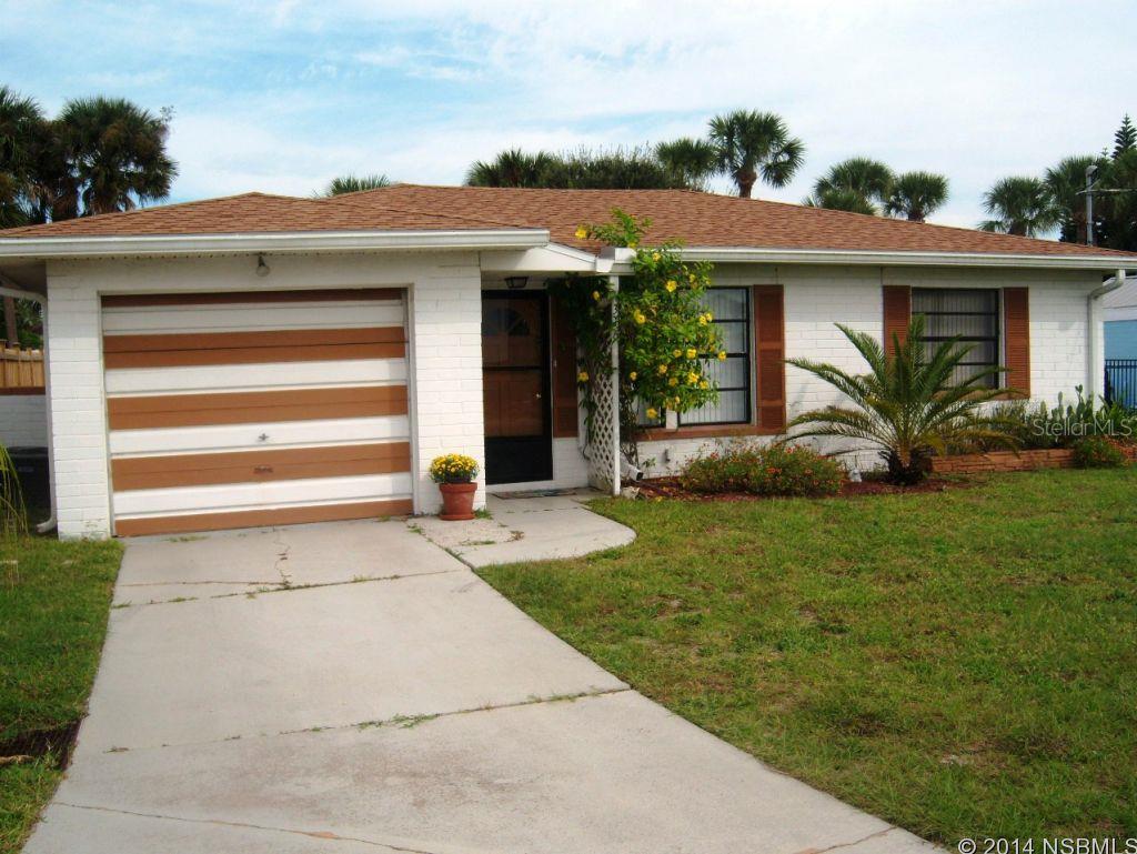 Listen to the sound of the Ocean from the backyard Deck! This home has a bright beachy dÃ©cor. Their is a glass enclosed Florida Room that would be great for reading or just enjoying the views of the beautiful large back yard. This house comes with everything you need for a perfect vacation. Esther St park is just a short walk away. It has  benches for enjoying the ocean views and a beach walkover. This home is just a few blocks off of Flagler Ave. Close to shopping and dining and night life. This is just the perfect location! Ample parking for boat/trailer