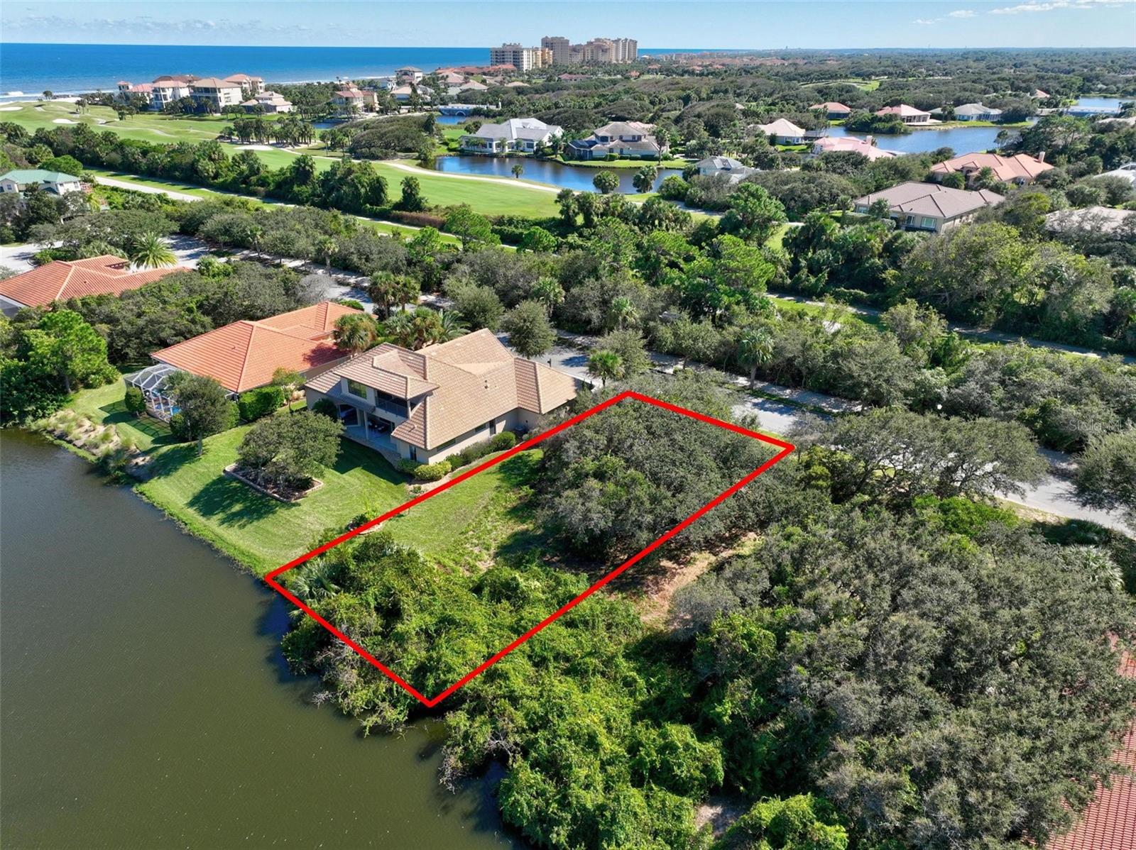 Design Your Coastal Dream Home in the luxurious Ocean Hammock Community! Discover the perfect canvas for your custom-built home in one of Palm Coast’s most coveted gated communities—Ocean Hammock. This nearly quarter-acre homesite offers 70 feet of peaceful lake frontage, where tranquil water views and gentle ocean breezes set the tone for relaxed coastal living. Nestled within a private, guard-gated enclave, this lot combines security, serenity, and sophistication. With a lush preserve directly across the street, you’ll enjoy added privacy and the assurance of no future development. An 8-foot easement from the neighboring property provides flexibility for a more spacious home design, and established utilities simplify the build process—so you can start bringing your vision to life with ease. Just minutes from the Atlantic shoreline, residents of Ocean Hammock enjoy an unmatched coastal lifestyle with easy access to pristine beaches, world-class golf, and upscale amenities. Whether you’re envisioning a full-time residence or a luxury vacation retreat, this property offers the rare opportunity to create a home that truly reflects your style and aspirations. Don’t miss this chance to own a piece of paradise in the sought after Ocean Hammock community. Schedule your private viewing today and begin building the coastal life you’ve always imagined.