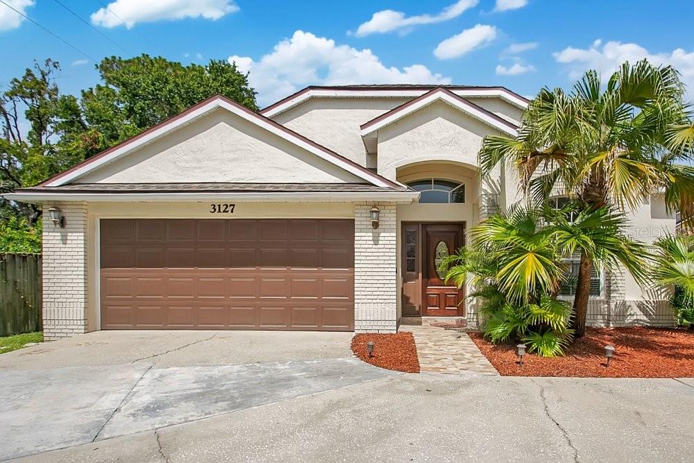 This newly renovated and elegant single story residence offers a modern, low maintenance layout suited for any lifestyle. The open concept design seamlessly blends the kitchen, living, and dining areas, creating a bright and functional space with effortless access to the covered patio—perfect for indoor and outdoor Florida living. The generous owner’s suite provides a relaxing retreat, complete with a spacious full bathroom and walk-in closets for exceptional comfort and storage. The home is beautifully decorated and includes newer stainless steel appliances—stand alone stove with over the counter microwave, dishwasher, and a three door stainless steel refrigerator—all included in the purchase price. Residents will appreciate convenient access to major highways, excellent schools, abundant recreation, and a wide variety of shopping, dining, and entertainment options. Proximity to key roadways ensures easy travel throughout Central Florida and smooth commutes to downtown Orlando.
