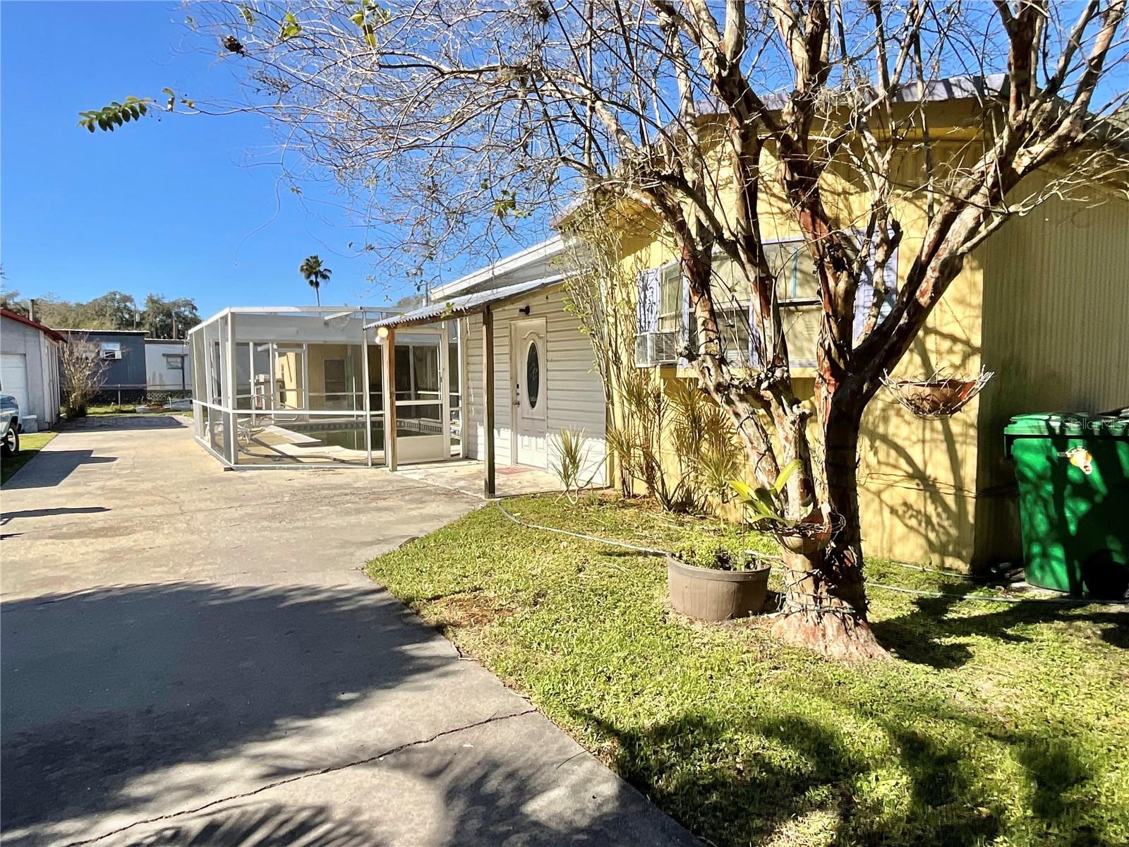 GREAT INVESTMENT OPPORTUNITY!
Discover the potential in this unique property featuring two single-wide homes with a shared private pool — perfect for investors or multi-generational living. Included Parcels: PID 27-28-29-000000-022090 and 27-28-29-000000-022250. Each lot measures 50 x 104 and is deeded separately, but both will be sold together only. About the Properties: Home #1: Move-in ready with a split bedroom layout, indoor utility area, and plenty of space for relaxing. Home #2: Features 2 bedrooms, 1.5 baths, a screened room, and a utility shed. This home needs some TLC before occupancy, making it ideal for a handyman or investor.
Property Highlights: Private in-ground swimming pool for shared use, Chain-link fence around the property for privacy and security, Convenient location within 0.2 miles walking distance to shopping and daily amenities. This is an excellent opportunity to live in one home while renting out the other for additional income.

Don’t miss out! Contact us today to schedule your private showing.