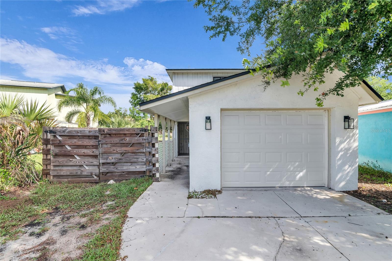 Welcome to your coastal retreat in beautiful Flagler Beach! This recently refreshed two-story home perfectly blends comfort, style, and durability featuring 2 bedrooms, 2.5 baths and a thoughtfully designed layout that maximizes both space and functionality. Extensive updates include a new roof (2023), fresh interior and exterior paint (2023), and LVP flooring throughout that offers both modern appeal and long-lasting durability that’s ideal for beachside living. The updated kitchen is a true highlight, showcasing shaker cabinetry, quartz countertops, tile backsplash, and stainless steel appliances, creating an inviting space for everyday living and entertaining. The adjoining Living Room includes a cozy dining area and opens to a covered patio and spacious yard that’s fully fenced in, perfect for outdoor dining, entertaining or unwinding while enjoying the coastal breeze. Upstairs, the spacious primary bedroom offers a peaceful retreat with a generous closet and private access to a large balcony where you can relax and take in the fresh ocean air. The ensuite bath features a walk-in tile shower and quartz vanity while the second full hallway bathroom includes a tub/shower combination. All bathrooms have been updated with thoughtful design and modern finishes. Located just moments from the beach, this home provides easy access to everything Flagler Beach has to offer from sunrises over the ocean to dining, shopping, and outdoor activities. Move-in ready and beautifully updated, this home is perfect for those seeking a low-maintenance coastal lifestyle.