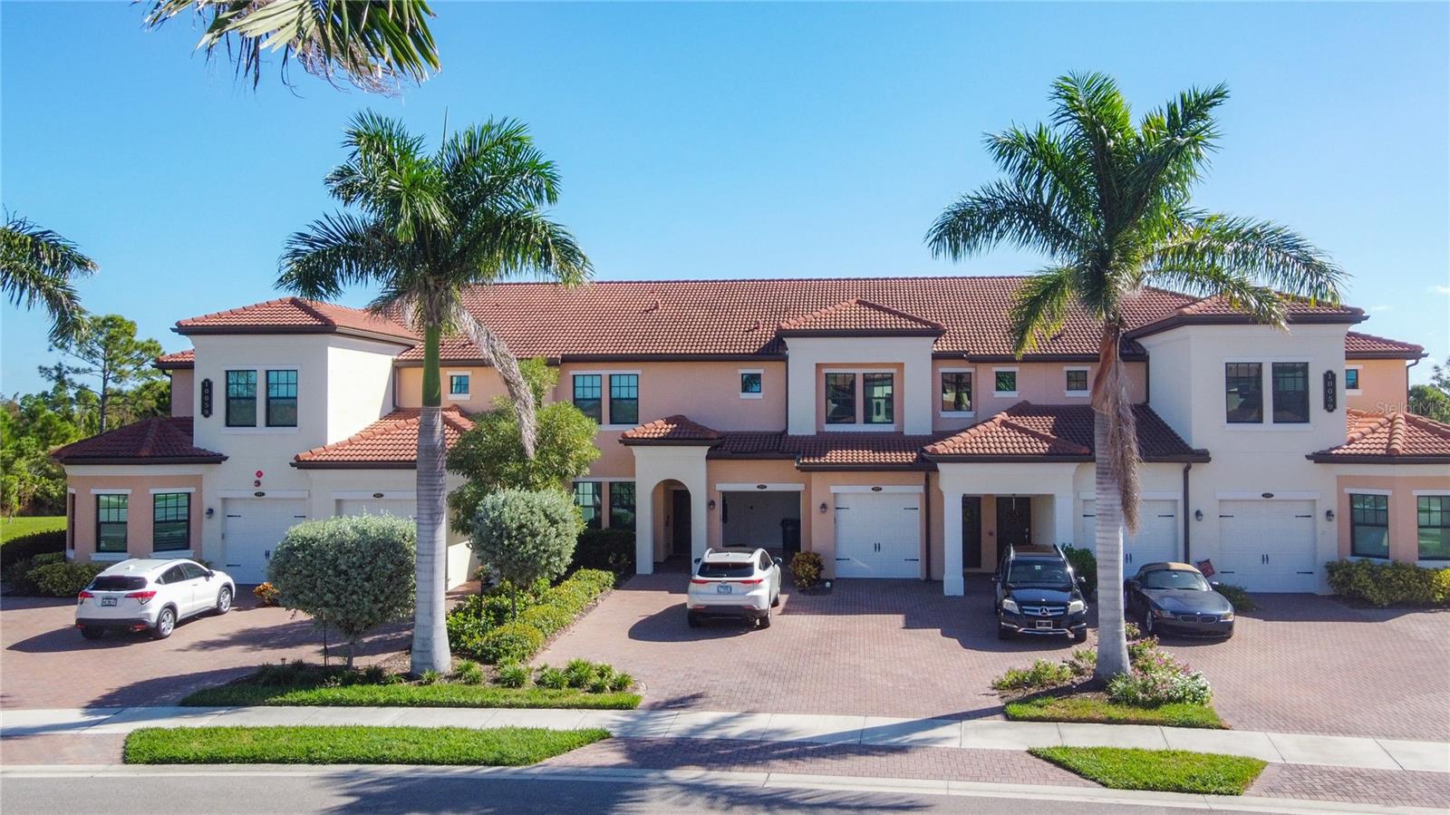 Welcome to luxury living at Sarasota National, an upscale guard-gated community that epitomizes resort-style living. This professionally designed, former model home conveniently located on 1st floor boasts a spacious and bright open concept living area, perfect for both relaxation and entertaining guests.

Indulge in an array of unrivaled amenities that define the essence of luxury living. The community features a magnificent clubhouse, an exquisite restaurant, a stylish bar and lounge. Rejuvenate by the sparkling swimming pool with a dedicated lap lane and beach entry or unwind in the inviting hot tub and enjoy a poolside tiki bar. Elevate your fitness regimen in the state-of-the-art fitness center, equipped with top-of-the-line machines, also offers group fitness and classes. For sports enthusiasts, there are tennis courts, bocce and pickleball. Designated dog park is just perfect for your furry friends.

This meticulously designed and decorated condo reflects a keen attention to detail. Highlights include custom trim, elegant crown molding, a sophisticated tray ceiling, designer lighting, and tasteful decorative wallpaper. This fully furnished condo includes 2 bedrooms and 2 bathrooms, featuring a thoughtful split floor plan that ensures privacy and comfort.
Retreat to the master suite, where a serene en suite bathroom awaits, complete with dual sinks, a luxurious walk-in glass shower, a separate water closet, and an enormous walk-in closet. 
Enjoy seamless indoor-outdoor living with three sliding doors that open to a screened lanai, revealing breathtaking private views of the lush preserve.
The gourmet kitchen is a culinary delight, featuring 42" white shaker-style cabinets, an oversized island adorned with quartz countertops, premium hardware, and sleek stainless-steel appliances. With ample storage and a closet pantry, this kitchen is designed for both function and style.
Condo comes with attached garage and paved driveway offers plenty of additional parking. 
Experience unparalleled luxury and lifestyle at this exquisite condo in Sarasota National – your forever home awaits.
This is a premium Venice location, just minutes from Wellen Park town center with variety of restaurants, boutiques, live entertainment and farmer's market.  Pristine local white sand beaches are short drive away. 
This fully furnished, move in ready condo is waiting for new owners. This is MUST SEE. Schedule your showing and you will be impressed.