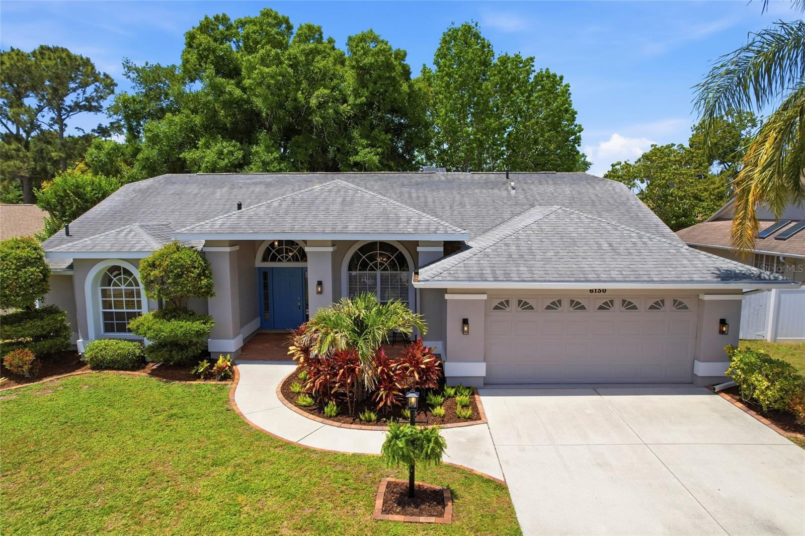 Major Price Reduction!!! Ideally located in the heart of Bradenton, this beautiful home in the highly sought-after River Landings Bluff community truly stands out. LOW HOA • NO CDD • NO FLOOD ZONE—pure, worry-free living. From the moment you arrive, you’ll notice the exceptional curb appeal, highlighted by fresh exterior paint and lush, well-maintained landscaping.
Step inside to an immediate wow moment. The family and dining area features a custom-crafted accent wall and striking mural, complemented by custom furnishings that create a unique and inviting space.
The open-concept living area seamlessly connects the spacious living room and kitchen, complete with a cozy wood-burning fireplace—perfect for relaxing or entertaining. The updated kitchen shines with crisp white cabinetry, a new backsplash, stainless steel appliances, and a charming breakfast nook.
Down the hall are three generously sized bedrooms and an updated bathroom. On the opposite side, the private primary suite offers two walk-in closets and a beautifully designed en-suite with a soaking tub, walk-in shower, and dual vanities.
Recent updates include new bathrooms, new flooring, lighting fixtures, blinds, fresh interior paint, and tasteful custom finishes throughout.
The true highlight is the expansive L-shaped covered and screened lanai overlooking a lush, private backyard—creating a peaceful outdoor retreat.
Ideally situated, this community offers a quiet, well-established setting with tree-lined streets and a welcoming atmosphere. Enjoy convenient access to shopping, dining, parks, I-75, the airport, and the beautiful Gulf Coast beaches, all while tucked away in a serene residential area.
Don’t miss this opportunity—schedule your private showing today!