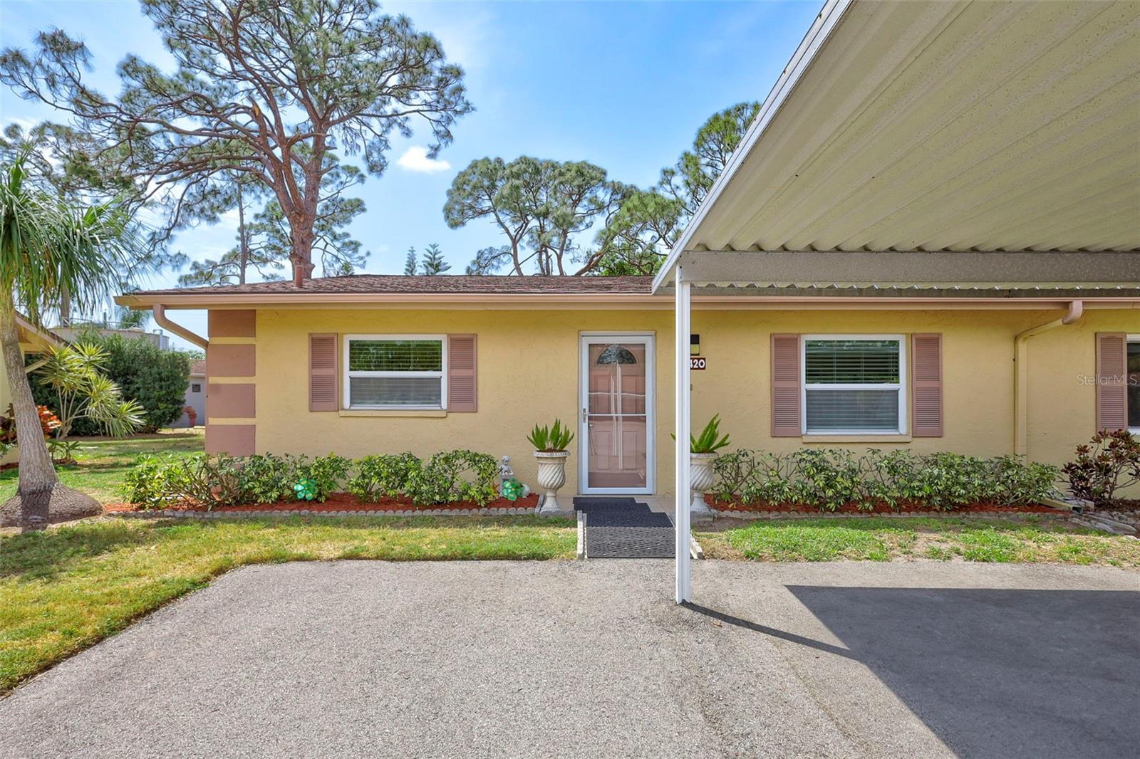 Back on the market and priced to sell!! A MUST SEE impeccable gem!! This is the one you've been looking for! Beautifully recently updated 2-bedroom, 2-bathroom villa. Nestled in a peaceful cul-de-sac within the sought-after maintenance-free 55+ community of Lake Tippecanoe, this charming well-appointed end-unit villa is ready to impress! The home features a bright, spacious, open floor plan, with an abundance of storage/closets and high-end finishes. Recent newer upgrades include: porcelain tile flooring and recessed lighting throughout, newer blinds, newer front doors and front glass screen door, plus granite countertops in both kitchen and bathrooms, kitchen backsplash and newer tiled showers with glass doors for an elegant touch. Offering newer AC 2021, located in the storage closet in lanai for maintenance convenience, + 2024 dishwasher. There's also no carpet, no popcorn ceiling, recently painted interior, freshly landscaped exterior, and for added convenience there's an interior laundry closet and a carport with guest spot right out front. 
Enjoy the tranquil atmosphere of the private back porch, which comes with a newly installed in 2025 screen and door, and storage closet.
You'll just love tis active social community offering the amenities you want in your Florida home, including a heated pool, clubhouse, pool table, shuffleboard court, and breathtaking views of serene Lake Tippecanoe just across the way. Can you imagine, the affordable monthly fees have actually been recently lowered?! It covers lawn maintenance, community pool, clubhouse, internet, basic cable, water, sewer, pest control, management, and roof.
Centrally located in Sarasota, you'll be close to our famous beaches, Downtown Sarasota, UTC area, golf courses, shopping, dining, hospitals, and more! Don’t miss the opportunity to make this hidden gem your own year-round home or home away from home—schedule a tour today!