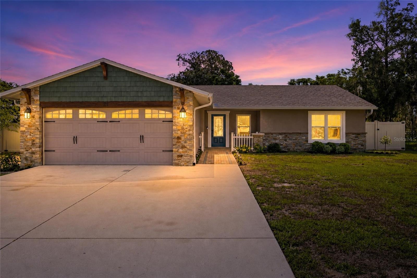 Welcome home to this beautifully updated 4-bedroom, 2-bath residence tucked away on a quiet cul-de-sac in Eustis! Combining thoughtful upgrades, energy-efficient improvements, and top of the line finishes, this move-in-ready home offers comfort and peace of mind from day one.
Major updates include a NEW Owens Corning 50-year architectural shingle roof (2026), Trane XR 17 SEER HVAC system with all-new ductwork (2023), new attic insulation (2023), foam-insulated block walls, updated 200-amp electrical service, and Simonton double-pane, Argon-filled windows. The HVAC also features a HALO whole-home air purification system, while the smart thermostat allows you to control your home's comfort from anywhere.
Inside, you'll find beautiful Cali Bamboo fossilized solid bamboo flooring, new bedroom carpet (2024), solid-core interior doors, remodeled bathrooms (2026), updated ceiling fans, barn-style closet doors, and custom closet shelving. Both bathrooms feature Bluetooth-enabled exhaust fans with dimmable lighting and built-in speakers.
The heart of the living room is a stunning custom real stone fireplace featuring a premium MagikFlame insert with realistic holographic flames, heat, sound effects, Wi-Fi/app control, and remote operation. The kitchen is equipped with Samsung stainless steel appliances, including a newer refrigerator (2024).
The oversized *air-conditioned* garage features an insulated garage door, smart Wi-Fi jackshaft opener, and offers flexible space for hobbies, a workshop, or home gym all in the comfort of AC.
Step outside to enjoy the fully vinyl-fenced backyard complete with a convenient trash corral, 7'x7' Craftsman storage shed, and plenty of room to play, garden, or entertain.
With countless upgrades throughout and major mechanical systems already updated, this exceptional home offers the perfect blend of quality, efficiency, and modern convenience. Schedule your private showing today!