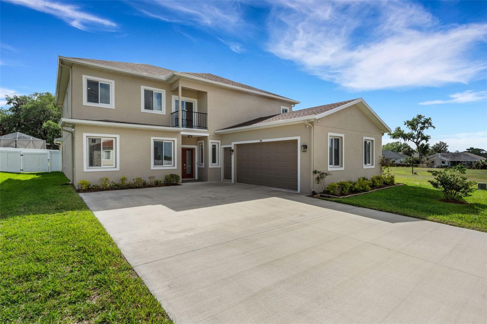 Welcome to this exceptional custom built luxury residence located in a quiet, gated South Lakeland community. Offering 3,757 SF of living area, featuring 5 spacious bedrooms, 5 full bathrooms, including 4 en suite baths + media ready / game room with closet for a 6th bedroom + computer room.  This less than two year old home has been meticulously cared for offering many upgrades. 

Designed for both comfort and functionality, the home features dual HVAC systems (one per floor), abundant natural light from an east west orientation, and thoughtful future proofing with a dedicated elevator provision. Every bedroom includes walk in closets, ceiling fans, and media/internet readiness.

The gourmet kitchen is richly appointed with granite countertops, 42” soft close upgraded cabinetry, under cabinet lighting, gas cook top, pot filler, built in oven and microwave, garbage disposer, and brand-new appliances with a powerful matching exhaust hood and a large walk-in pantry.  Granite surfaces and upgraded cabinetry continue throughout all bathrooms, including the pool bath, with custom glass shower enclosures, tiled shower walls, and anti-skid flooring. All toilets are prewired for bidet installation.

Step outside to a true resort style outdoor retreat, showcasing a 28x16 heated saltwater pool with jets and lighting, fully enclosed by a screened lanai with brick paved pool deck and seating areas. The lanai includes a full pool bath, plus a hot and cold outdoor shower, multiple hose bibs, and electrical provisions for a future outdoor kitchen. Enjoy entertaining and grilling in your summer kitchen, built in sink and expanded SS gas grill and grilling accessories included. 

Additional highlights include a fenced yard, second floor balcony, gutters, water softener, under sink water filtration, WiFi enabled irrigation system, and a well-equipped laundry room with cabinetry, granite counters, steel sink, and dual waste bins. This home offers a rare blend of modern construction, extensive upgrades, and move in ready luxury, all within one of Lakeland’s most desirable gated neighborhoods.  Enjoy all of what Lakeland and Central Florida has to offer.  Many trails and parks, lakes, golf courses, tennis & pickleball courts.  Lakeland Linder International Airport now offering direct flights to many U.S. cities.