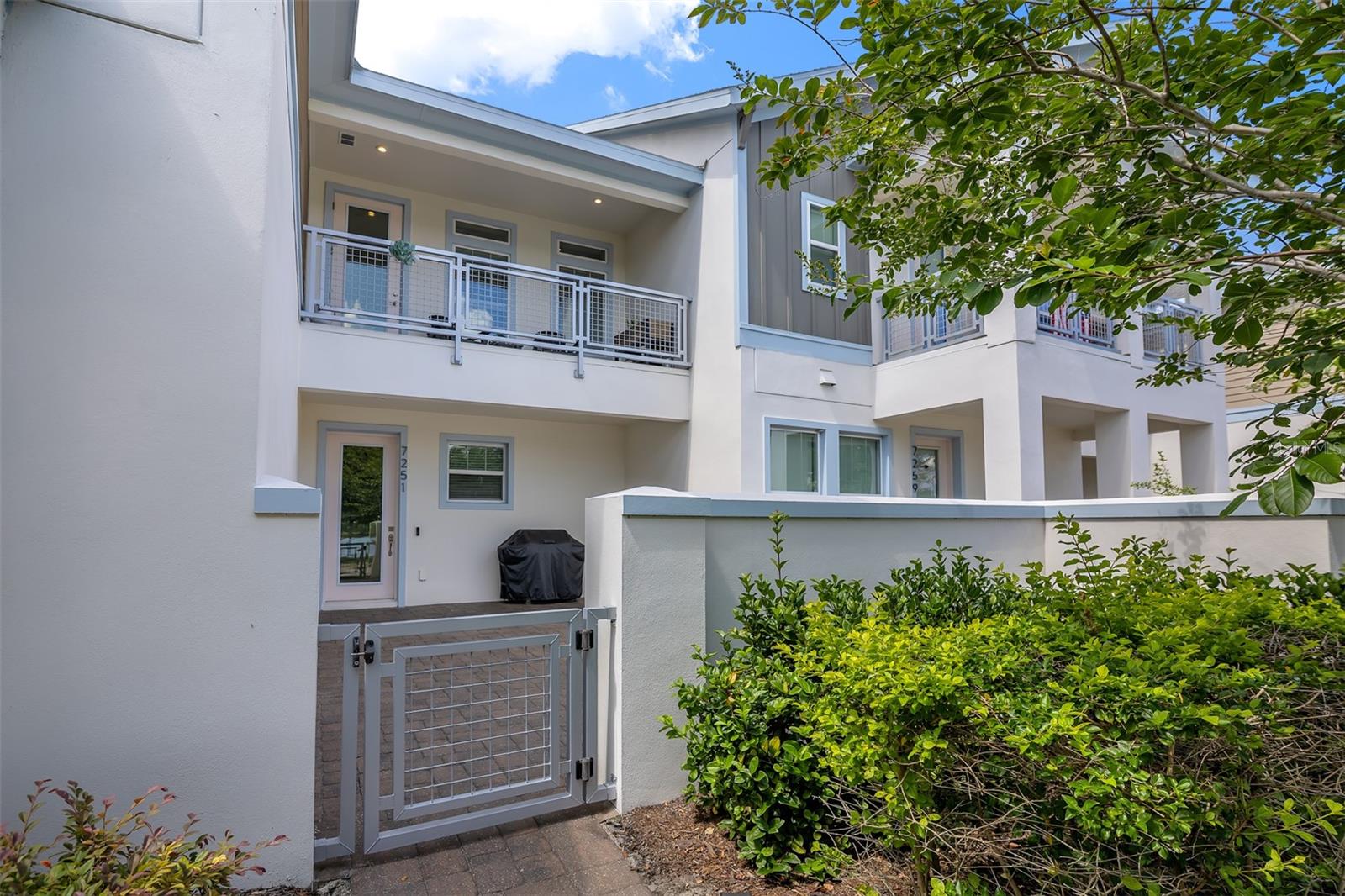Gorgeous like-new two-story townhome at Laureate Park – Lake Nona. This beautiful and unique home has 2 bedrooms and 2 full baths + 1 extra multi-functional space with a storage closet that can be used as an office, gym, game room or more. Second floor features an open floor plan with Kitchen, Dining and Living Room perfect for gatherings and family time. Bedrooms, Bathrooms and Laundry room are upstairs as well as a covered Balcony to enjoy the beautiful water view. A two-car garage attached to the back of the townhome offers an electric vehicle charging station. Facing front there is an open patio area all pavers throughout, perfect for outdoor entertaining. Enjoy the Lake Nona Lifestyle with its resort style pool, fitness center, restaurants, marketplace, dog park, community events, parks, playgrounds and Top-rated schools. Lawn Care, Internet, Basic Cable and Amenities are included in the HOA Fees.