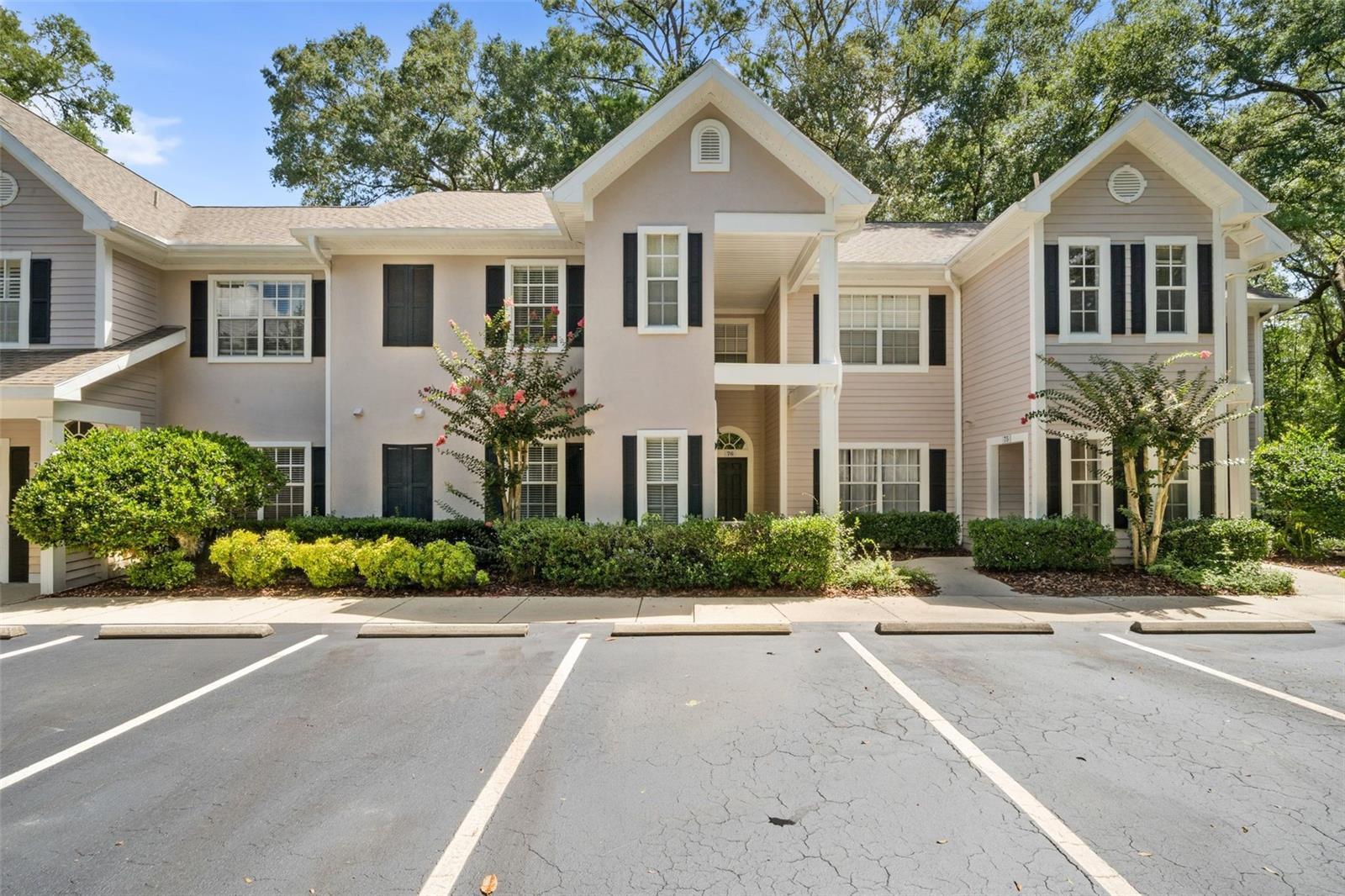 Enjoy the perfect combination of convenience, resort-style amenities, and the natural beauty that make Haile Plantation one of Gainesville's most sought-after communities. Nestled within The Links at Haile Plantation, this beautifully maintained 3-bedroom, 2-bath second-floor condo offers 1,454 square feet of thoughtfully designed living space and the largest floor plan available in the community. Featuring soaring vaulted ceilings, beautiful bamboo flooring, and a desirable split-bedroom layout, this home offers the perfect balance of spaciousness, comfort, and functionality.

Residents of The Links enjoy exclusive access to a private swimming pool, fitness center, and clubhouse. Memberships are available at nearby Hawkstone Country Club, featuring an 18-hole championship golf course designed by Gary Player, tennis and pickleball courts, two swimming pools, a state-of-the-art fitness center, exceptional dining, and an active social calendar.

Inside, the open-concept layout is filled with natural light and designed for comfortable everyday living and effortless entertaining. The kitchen features brand-new stainless steel appliances, a pantry, breakfast bar, and overlooks the main living space. A built-in office nook provides the perfect space for working remotely or studying, while a newer water heater offers added peace of mind.

The spacious primary suite features a large walk-in closet and an updated ensuite bathroom with dual vanities, new sinks, and updated fixtures. Two additional bedrooms feature oversized closets and share a beautifully updated guest bathroom. Additional conveniences include abundant guest parking and designated boat and RV parking.

One of this home's standout features is its private balcony overlooking the Haile Plantation Urban Ecology Trail. Backing directly to wooded green space, this peaceful retreat offers scenic nature views and immediate access to more than 7.5 miles of walking, running, and biking trails, creating a level of privacy and tranquility rarely found in condominium living.

Less than 1.5 miles from Haile Village Center, you'll enjoy local restaurants, boutiques, coffee shops, and the popular weekly Farmers Market. Conveniently located near Celebration Pointe, Butler Plaza, UF Health Shands Hospital, the University of Florida, and I-75, everything Gainesville has is just minutes away.

Offering the largest floor plan in The Links, outstanding community amenities, and direct access to one of Gainesville's most scenic trail systems, this move-in-ready home is a rare opportunity to experience the very best of Haile Plantation living. Schedule your private showing today!