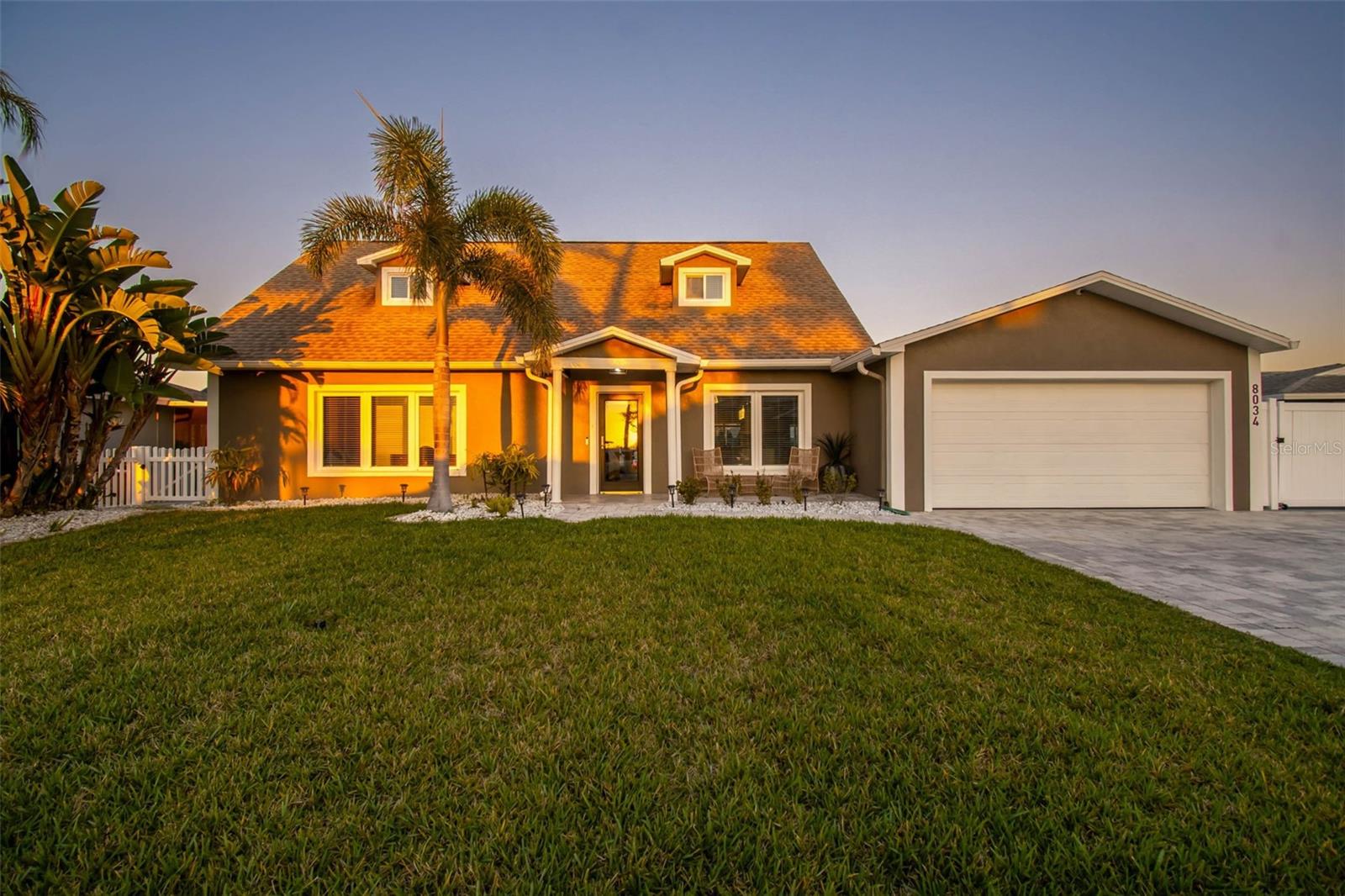 Virtually Staged. Waterfront Luxury Living in Prestigious Harbor Isles!
You don't want to miss this exceptional waterfront residence located in the highly coveted community of Harbor Isles—where refined living meets the effortless beauty of Florida’s Gulf Coast. Perfectly positioned on a deep-water canal with direct Gulf access in minutes, no waiting for tides to go boating the Gulf is calling you out to paradise all the time.  This home offers a rare opportunity to embrace a true luxury boating lifestyle from your private dock with dual electric lifts.
From the moment you enter the dramatic two-story foyer, you’re greeted with a sense of sophistication and openness that carries throughout the home. Thoughtfully designed for both elegant entertaining and everyday comfort, this residence features 3 spacious bedrooms, 2 private offices (one easily serving as a 4th bedroom), and a 2-car garage.
At the heart of the home lies a stunning chef’s kitchen, appointed with brand new 1 year old high-end appliances, an expansive island topped with striking leathered granite, and seamless flow into the main living and dining spaces. Whether hosting intimate gatherings or lively celebrations, every detail has been curated to impress—enhanced by captivating sunset views that create the perfect evening ambiance.
The first-floor primary suite is a private sanctuary, complete with en-suite bath, washer & dryer and oversized walk-in closets. You also have 2 offices on the first floor with one of those that can be a 4th bedroom easily with French doors out to the oasis pool area and the other office out the front of the home for complete privacy for your clients. Upstairs, guests are treated to generously sized bedrooms, a well-appointed shared bath, and easy access abundance storage—ensuring comfort and privacy for all.
Step outside to your personal resort. The impressive 20x30 pool that is 8 feet deep, designed for both relaxation and lap swimming, is complemented by an expansive vaulted lanai featuring dedicated lounge and covered dining areas. 2025 Pool pump and pool filters. This seamless indoor-outdoor living experience defines Florida luxury—perfect for year-round enjoyment.
For boating enthusiasts, the 425 sq ft dock with two lifts offers effortless access to open waters, making every day on the Gulf just moments away.  Additional premium features are all hurricane rated windows and doors for additional peace of mind.  The HVAC and Hot Water Heater is 2025 and the roof is only 2015.  Set within one of the area’s most desirable waterfront neighborhoods, this home delivers a rare combination of location, luxury, and lifestyle.
Indulge in the waterfront life you’ve been waiting for—schedule your private showing today.