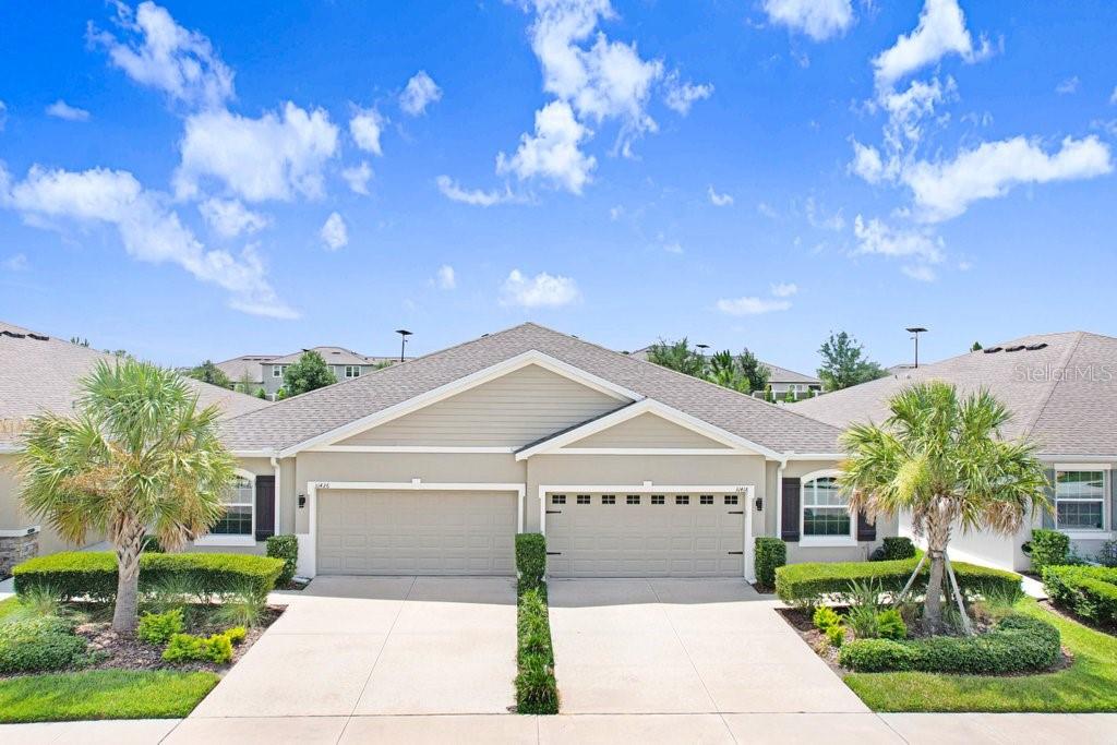 Resort-Style Living in the Villas of Mirada Lagoon

Experience the best of Florida living in the highly sought-after Mirada community, home to the spectacular 15-acre Crystal Lagoon. This impeccably maintained 3-bedroom, 2-bath villa with a spacious 2-car garage offers the perfect blend of modern comfort, low-maintenance convenience, and world-class amenities.

Designed for effortless living and entertaining, the bright open-concept floor plan showcases stylish cabinetry, granite countertops, and a generous living area that seamlessly connects the kitchen, dining, and gathering spaces. Luxury vinyl plank and tile flooring throughout provide both durability and contemporary appeal.

Step outside to the screened lanai and enjoy peaceful views of the private backyard—the perfect setting for morning coffee, evening cocktails, or simply unwinding after a day at the lagoon.

Built just six years ago and located in Flood Zone X, this home features modern energy-efficient construction and includes all appliances. Lawn maintenance is provided through the HOA, making it easy to enjoy a truly carefree lifestyle. HOA fees also include high-speed internet and cable service.

As a Mirada resident, you'll enjoy unlimited access to the renowned Crystal Lagoon, featuring a resident-only beach, swim-up bar, water slide, paddleboarding, kayaking, splash zone, Wibit obstacle course, and private event spaces. The community's active social calendar offers year-round entertainment, including live music, trivia nights, bingo, foam parties, silent discos, and seasonal celebrations.

Additional neighborhood amenities include miles of walking and biking trails, golf cart-friendly pathways, a playground, and a dog park.

Conveniently located near I-75 in the rapidly growing San Antonio area, Mirada offers easy access to Tampa while being positioned near exciting future shopping, dining, and entertainment destinations planned for the surrounding area.

Whether you're seeking a primary residence, seasonal retreat, or a low-maintenance lifestyle with exceptional amenities, this villa offers a rare opportunity to enjoy one of Pasco County's most desirable communities.

Schedule your private tour today and discover everything Mirada has to offer.