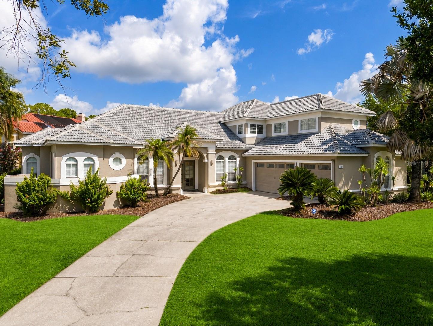 Experience exceptional Florida living in the heart of highly sought-after Dr. Phillips. This beautifully updated pool home features a new roof (2026), new main A/C (2026), all-new flooring, a brand-new outdoor summer kitchen, and a newly painted pool deck, offering true move-in-ready convenience. Situated on an oversized corner lot with minimal traffic, this spacious home is designed for entertaining with an open, flowing layout that extends to a private tropical backyard featuring a sparkling pool, spa, expansive screened lanai, and a stunning new summer kitchen—creating the ultimate Florida indoor-outdoor lifestyle. The fresh, modern color palette and generous living spaces make this home as stylish as it is functional. Located in the desirable Brentwood Club community, residents enjoy tennis courts, beautifully maintained common areas, and a low HOA.   Just minutes from Restaurant Row on Sand Lake Road, International Drive, world-class dining, shopping, entertainment, major highways, and Orlando’s renowned attractions, this home is also convenient to highly regarded Orange County public schools. Homes with this combination of premium updates, exceptional outdoor living, oversized homesites, prime location, and outstanding value rarely come to market in Dr. Phillips. Schedule your private showing today before this exceptional opportunity is gone.