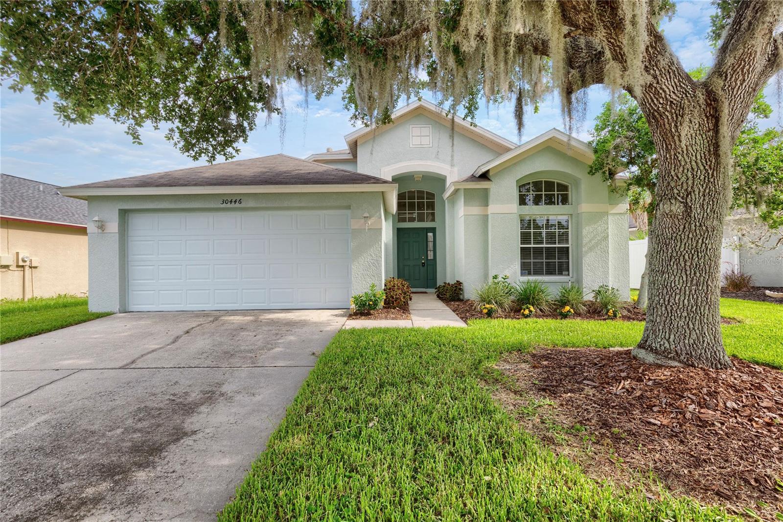 Welcome to 30446 Tremont Drive, a beautifully maintained 3-bedroom, 2-bath home located in one of Wesley Chapel's most desirable communities. This inviting residence features a functional split-bedroom floor plan, spacious living areas, and abundant natural light throughout.Enjoy Florida living year-round from the screened rear patio, perfect for relaxing, entertaining, or enjoying your morning coffee. A new privacy fence is scheduled to be installed soon, adding even more privacy and enjoyment to the backyard space. Residents enjoy access to outstanding community amenities, including a resort-style pool, basketball courts, tennis courts, and a playground, offering something for everyone in the family. Conveniently located near top-rated schools, shopping, dining, medical facilities, and major highways, this home provides the perfect blend of comfort, convenience, and community. Whether you're a first-time home buyer, downsizing, or seeking an investment opportunity, this is a property you won't want to miss. Schedule your private showing today.