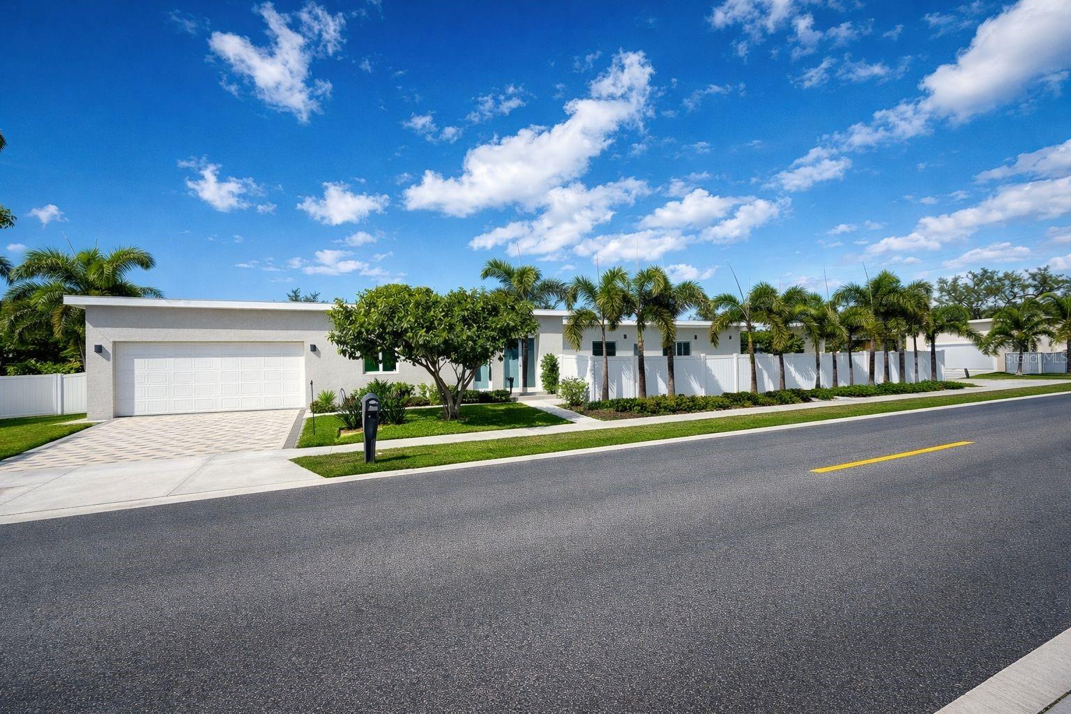 Price Improvement | Modern Pool Home | No HOA | Not in Flood Zone

One or more photo(s) has been virtually staged.Experience elevated Florida living in this beautifully updated 3-bedroom, 2-bath + office (optional 4th bedroom) concrete block home, built in 2016 and designed for both comfort and modern style.

Featuring 10+ ft ceilings, impact windows, tall Solid contemporary doors, and a bright open-concept layout, this home offers the perfect balance of elegance and functionality.

Situated on a premium corner lot, with no HOA and no CDD, and located outside of a flood zone, this property delivers privacy, flexibility, and peace of mind.
The designer kitchen showcases luxury appliances, custom cabinetry, an oversized island, and elegant lighting, seamlessly connecting to the spacious living and dining areas filled with natural light.
A standout feature is the indoor-outdoor design — expansive sliding doors open to a sleek lap-style pool with an oversized paver deck, and every bedroom offers direct access to the pool area, creating a unique resort-style experience.

The fully fenced backyard is surrounded by mature palm trees, offering a private tropical setting ideal for relaxing or entertaining.
Additional features include updated bathrooms, a spacious laundry room with custom cabinetry, and a 2-car garage.

Located approximately 4 miles from Siesta Key Beach and close to dining, shopping, and everyday conveniences.
Vacant and easy to show. Schedule your showing time.