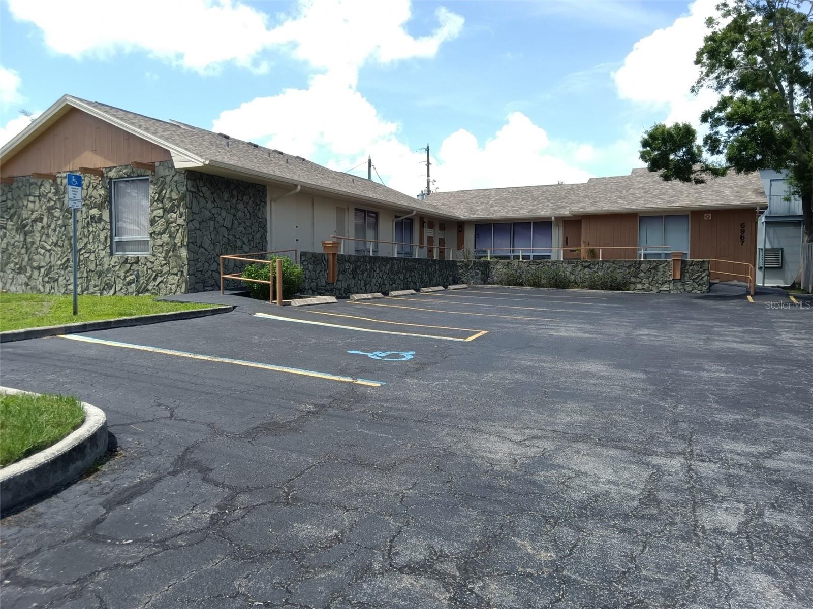Nice 3 office unit building in an "L" shaped configuration.  Nicely maintained. 4 restrooms, 15 parking spaces.  One unit (1450 s/f) is a dental office currently leased, the smallest unit (490 s/f) is rented as an art studio and the inside corner unit (810 s/f) is an owner occupied real estate office. All sizes are MOL.  Located directly behind the Publix supermarket on Pasadena Ave. and Sunset Dr. S.  Only minutes to the Gulf Beaches.  NO FLOODING IN THIS BUILDING DURING HURRICANE HELENE! Nearly every building flooded in this neighborhood EXCEPT THIS BUILDING!.  It has a 12 foot elevation according to the 1999 survey when it was purchased by the current owner.  Only the Wally Watt storage shed on the property flooded, 2 a/c units were replaced and one was repaired.  No water intrusion in this building, it is positioned much higher than other nearby properties!!!  The seller is retiring and the inside corner real estate office will be vacating the property leaving a new owner to occupy or lease out.  Roof was replaced in 2019.  Exterior has been freshly painted.  If you are looking for a nice investment property or want to owner occupy make an appointment to see this one.  Uses could be medical, dental, chiropractor, attorney, real estate, mortgage broker, appraiser, accountant, title company and many other numerous uses.  Listing broker is owner of property.