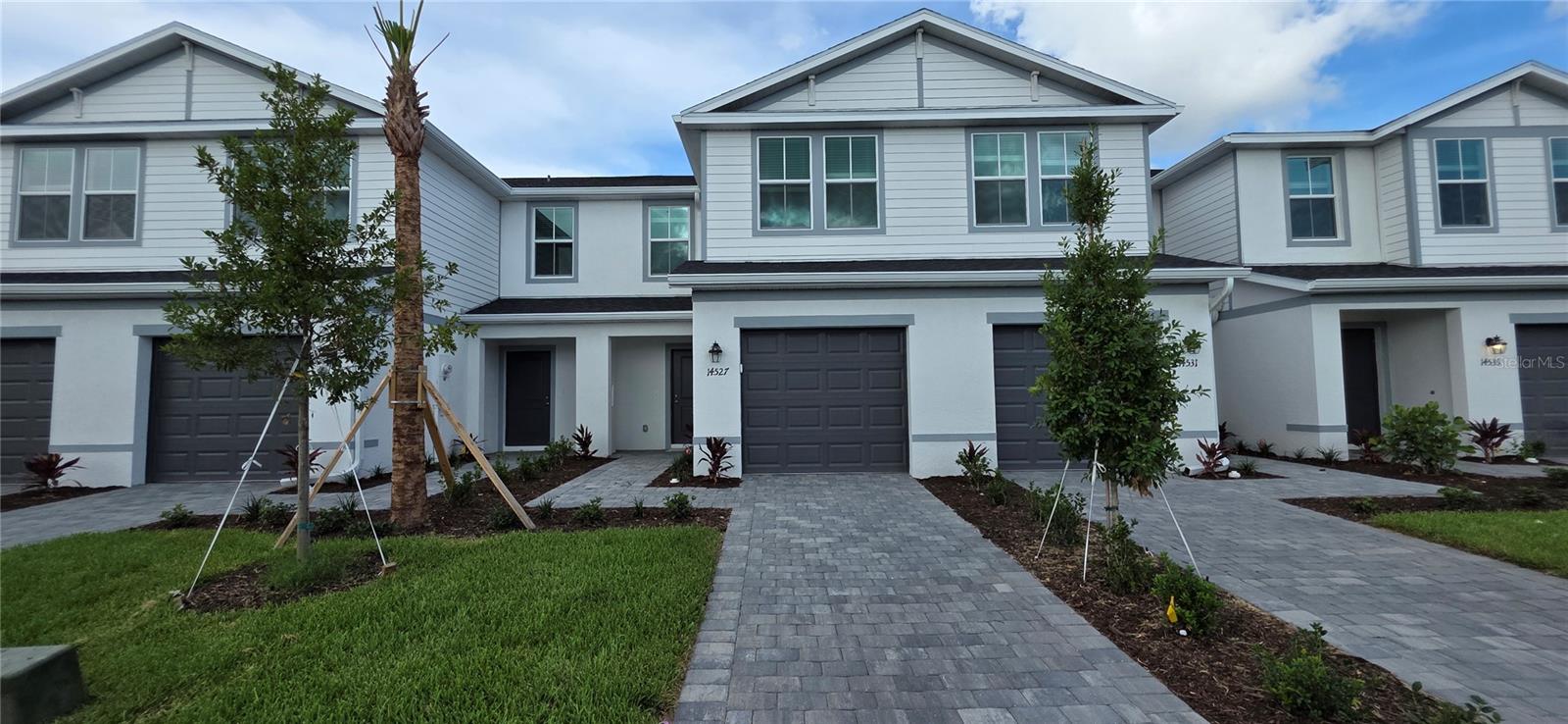 Brand-new and move-in ready! This Lennar Bennett floor plan in Aurora at Lakewood Ranch offers 3 bedrooms, 2.5 bathrooms, and a spacious open-concept design. The main level features a modern kitchen overlooking the dining area and great room, with sliding glass doors leading to a private patio. Upstairs, the owner's suite is joined by two additional bedrooms and a convenient laundry area. Featuring The Builders Everything's Included® package with stylish finishes, smart home features, and energy-efficient construction. Aurora residents enjoy maintenance-free living, a community pool, playground, scenic lakes, and convenient access to shopping, dining, schools, and all that Lakewood Ranch has.