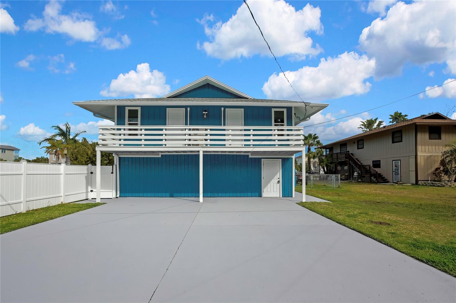 Exceptional waterfront opportunity with 120 feet of water frontage on a rare DOUBLE lot. This versatile property is thoughtfully set up as two separate units — ideal for short-term rental income, multi-generational living, or a private mother-in-law suite.
The first-floor unit offers a 2-bedroom, 1-bath layout, while the upper level features a spacious 3-bedroom, 2-bath configuration. Both units have been updated with new paint, flooring, and modern fixtures, creating a clean and cohesive feel throughout.
Major improvements provide peace of mind, including a new mini-split HVAC system, new electrical, new blown insulation, tankless water heater, and new deck, hurricane-rated windows, and doors. Outdoors, you’ll love the new tongue-and-groove ceiling detail, new vinyl fencing, insulated storage space, and a pool with a new pump and filter — perfect for enjoying the waterfront lifestyle.
A shared common area with laundry services both units, adding convenience for guests or extended family.
Whether you're looking for a high-performing investment property, a flexible primary residence with rental potential, or a true waterfront retreat, this property delivers location, upgrades, and opportunity all in one.