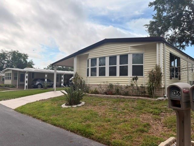Welcome to easy, low-maintenance living in the desirable Briar Creek 55+ resident-owned community surrounded by beautiful mature trees in Northern Tampa Bay.  The fee-simple land ownership means no lot rent! with a low monthly HOA fee of $250 that covers water, trash pick-up and lawn care along with community amenities which include a heated pool, clubhouse, social activities, pickleball, RV/Boat storage and allows golf carts and cat or dog up to 25 lbs.  Briar Creek is conveniently located and close to many dining options, shopping for every need, gorgeous beaches, golfing, two major airports, hospitals, sporting events and everything in between and around the Tampa Bay Area.

This meticulously maintained 2 bed / 2 bath updated home offers approximately 2000 sq ft of spacious comfort and offers a wonderful, light-filled open layout that does not need a new roof, or vapor barrier, has solid flooring throughout and new windows plus awning hurricane shutters with a 1-year-old HVAC system.  Modern kitchen appliances and plenty of storage spaces, custom wainscoting and new entry doors, a large, enclosed side patio with separate utility room and a covered carport.   The home is at a high elevation and not in a flood zone.  

Not much to do in this home that is move-in ready and ready for its new owner!  A Must See!